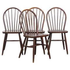 Set of 4 wooden in English style Windsor slat chairs from the 70s.