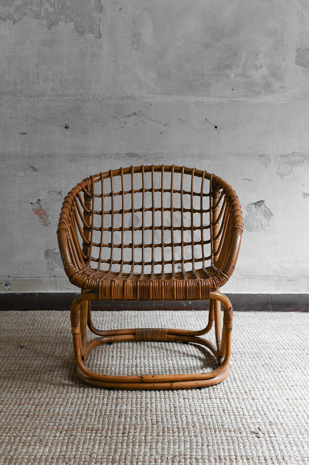 Bambou Ensemble de 4 fauteuils en bambou tissé dans le style de Tito Agnoli, 1970 en vente