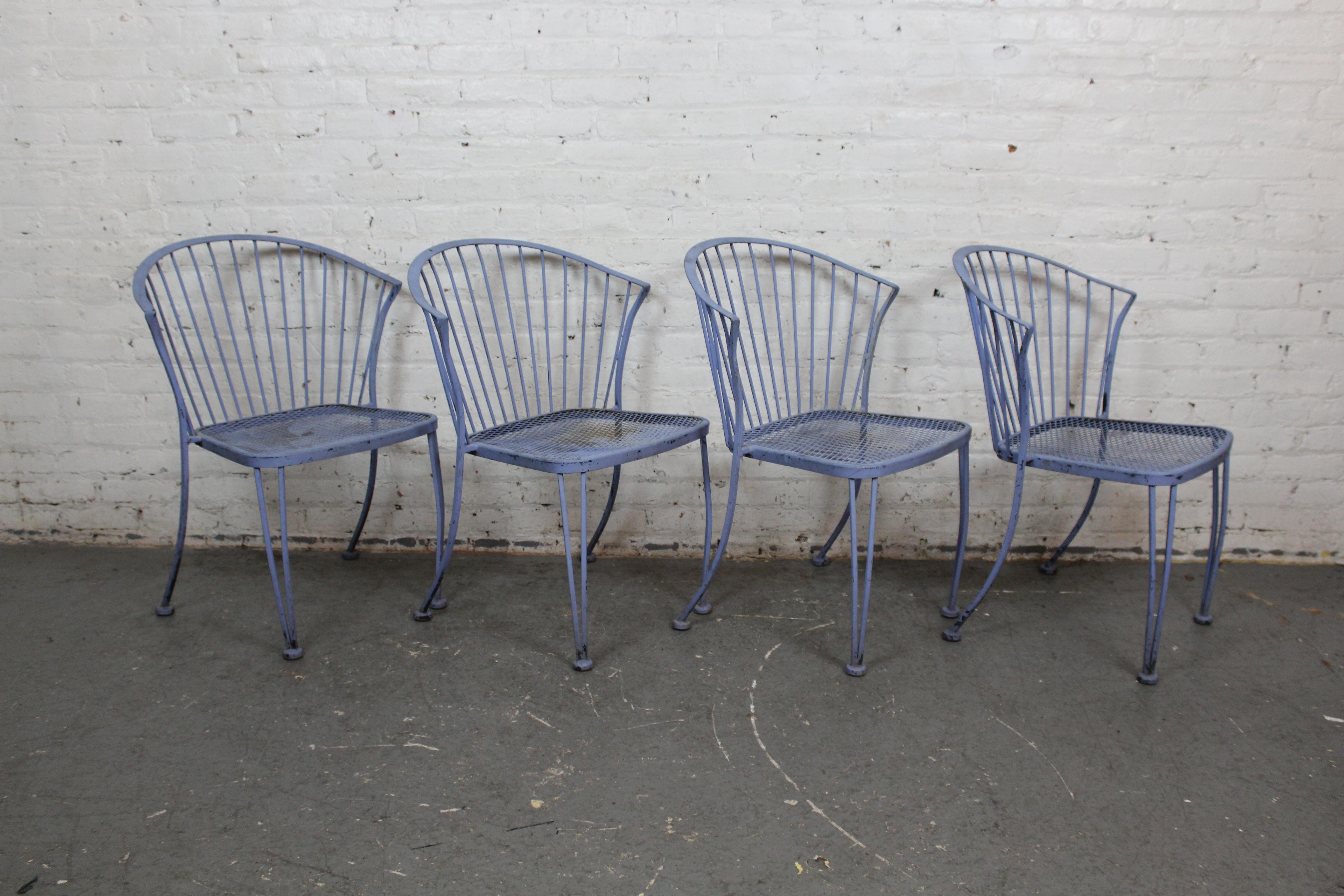 Discover the elegant durability of vintage patio furniture with these wrought iron 