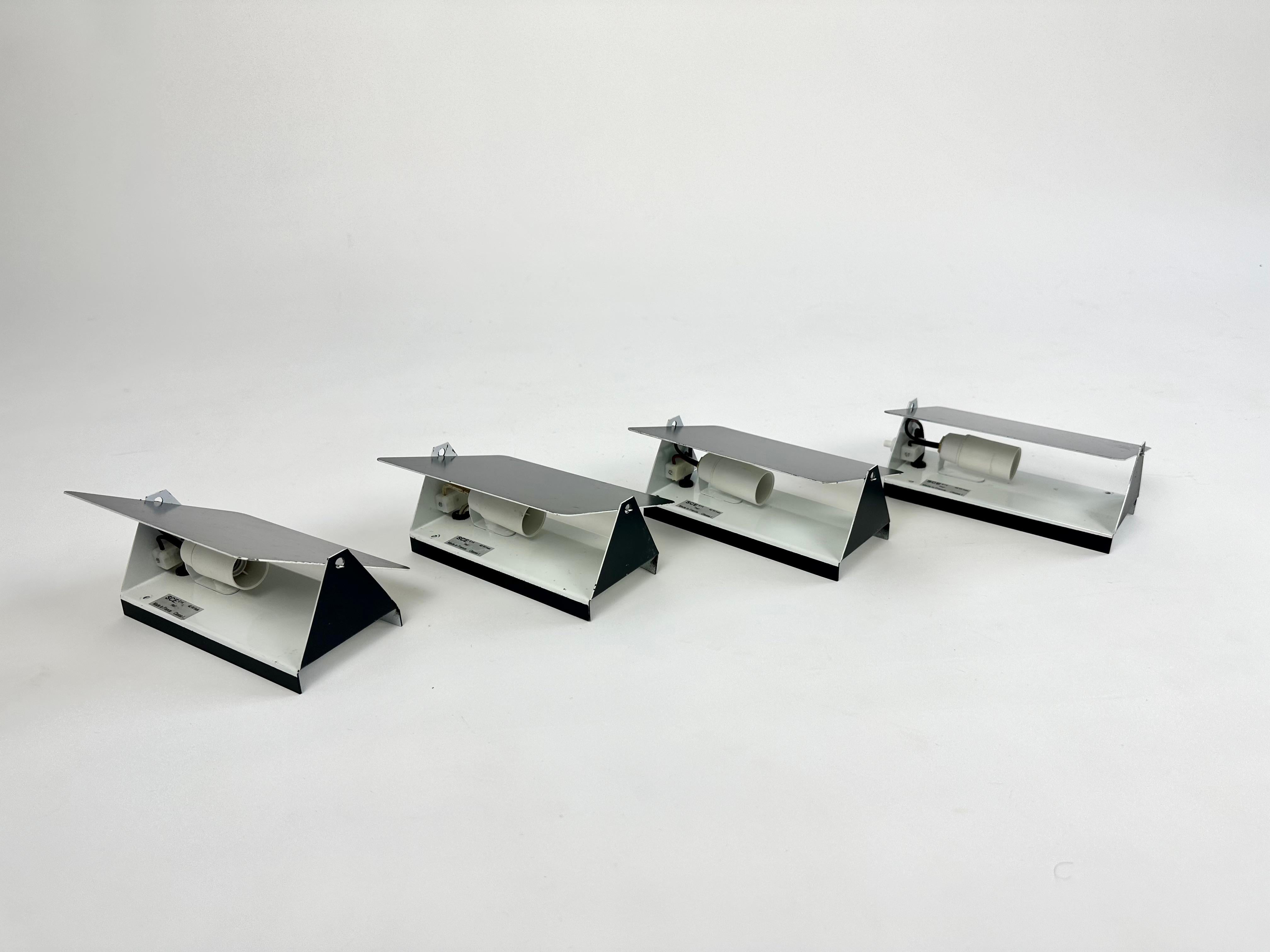 Set of 4 wall lights, model CP1 designed by Charlotte Perriand for Steph Simon.

Sourced from an estate clearance in the Haute Savoie region of France.

The set are 1970s editions.

Very good condition, no damage or dents. Signs of use in the way of