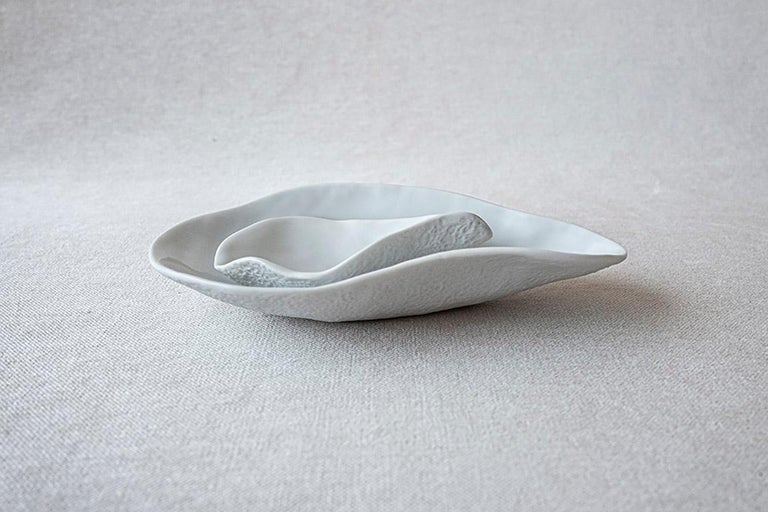• set of 4 x 2 small porcelain side dishes that complement each other
• measures 16cm x 8,5cm x 3cm and 9,5cm x 6cm x 3cm 
• perfect for a sexy amuse-bouche, a pre-dessert or side dish
• for that sexy dinner party
• white glazed top and unglazed