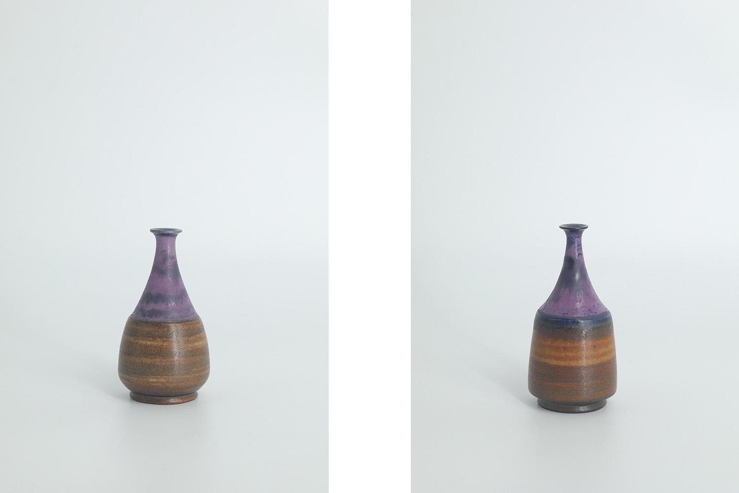 1. Height 8 cm  Width 4 cm  Depth 4 cm
2. Height 7 cm  Width 4 cm  Depth 4 cm
3. Height 7 cm  Width 4 cm  Depth 4 cm
4. Height 4 cm  Width 3 cm  Depth 3 cm

This set of 4 miniature vases was designed by Gunnar Borg for the Swedish manufacture