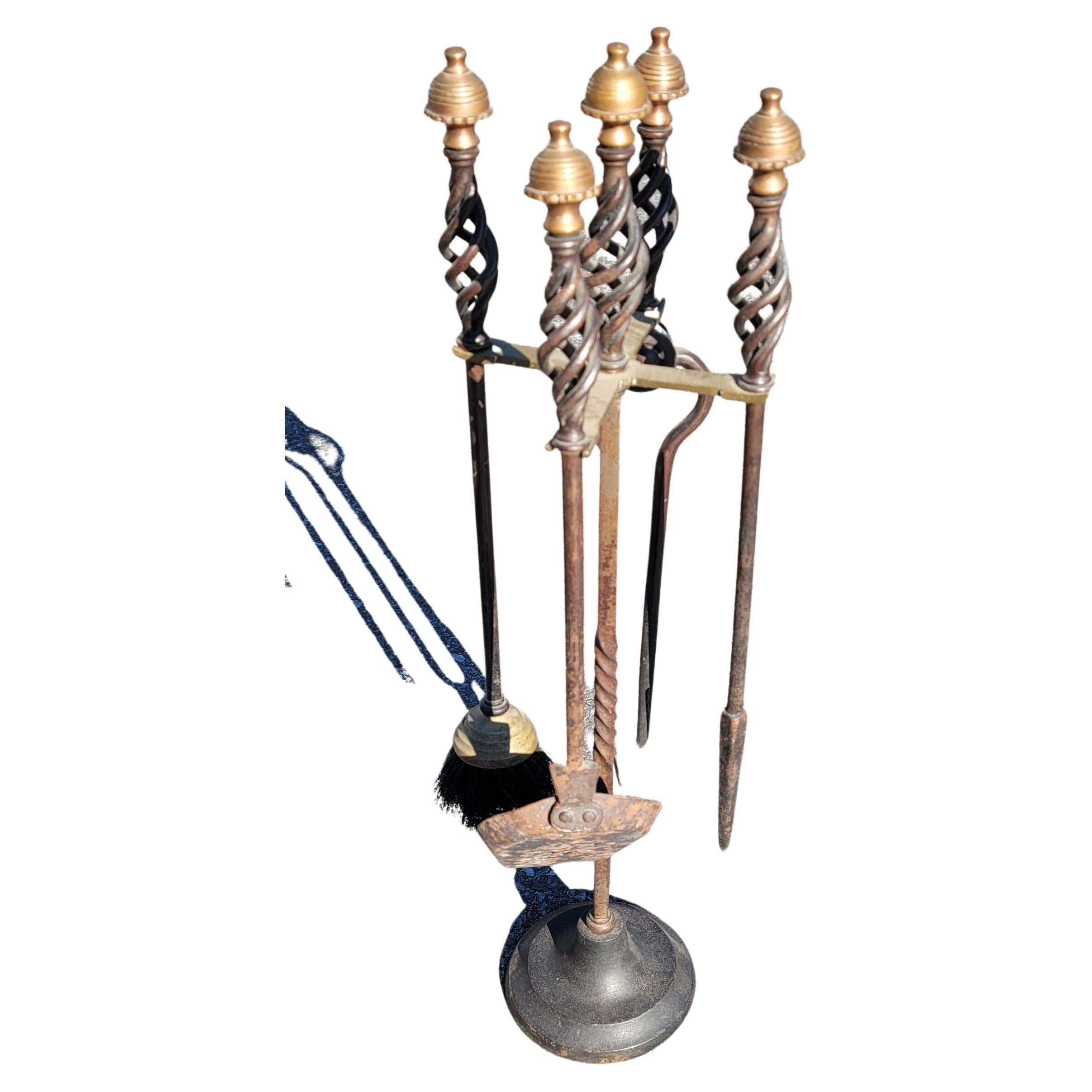 Set of 5 American Art Deco brass mushroom heads and iron fireplace tools with stand.
Mreasures 7