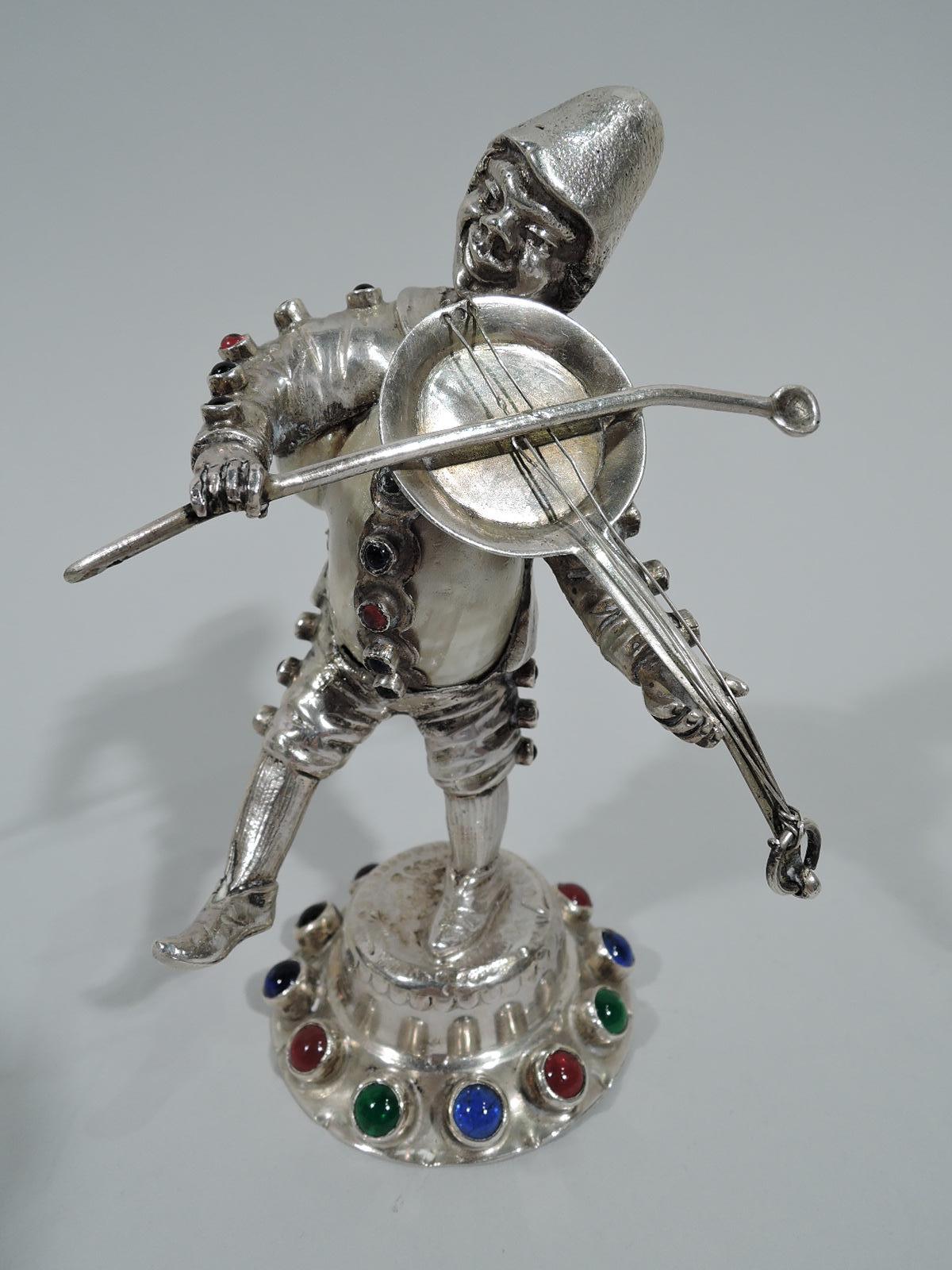 Five German 812 silver figures, ca 1880. This set comprises two musicians, a tankard-bearing tavern keeper, a fowl-serving wench, and a dagger-wielding pierrot let loose among these peaceful country folk. Each figure is silver and inset with