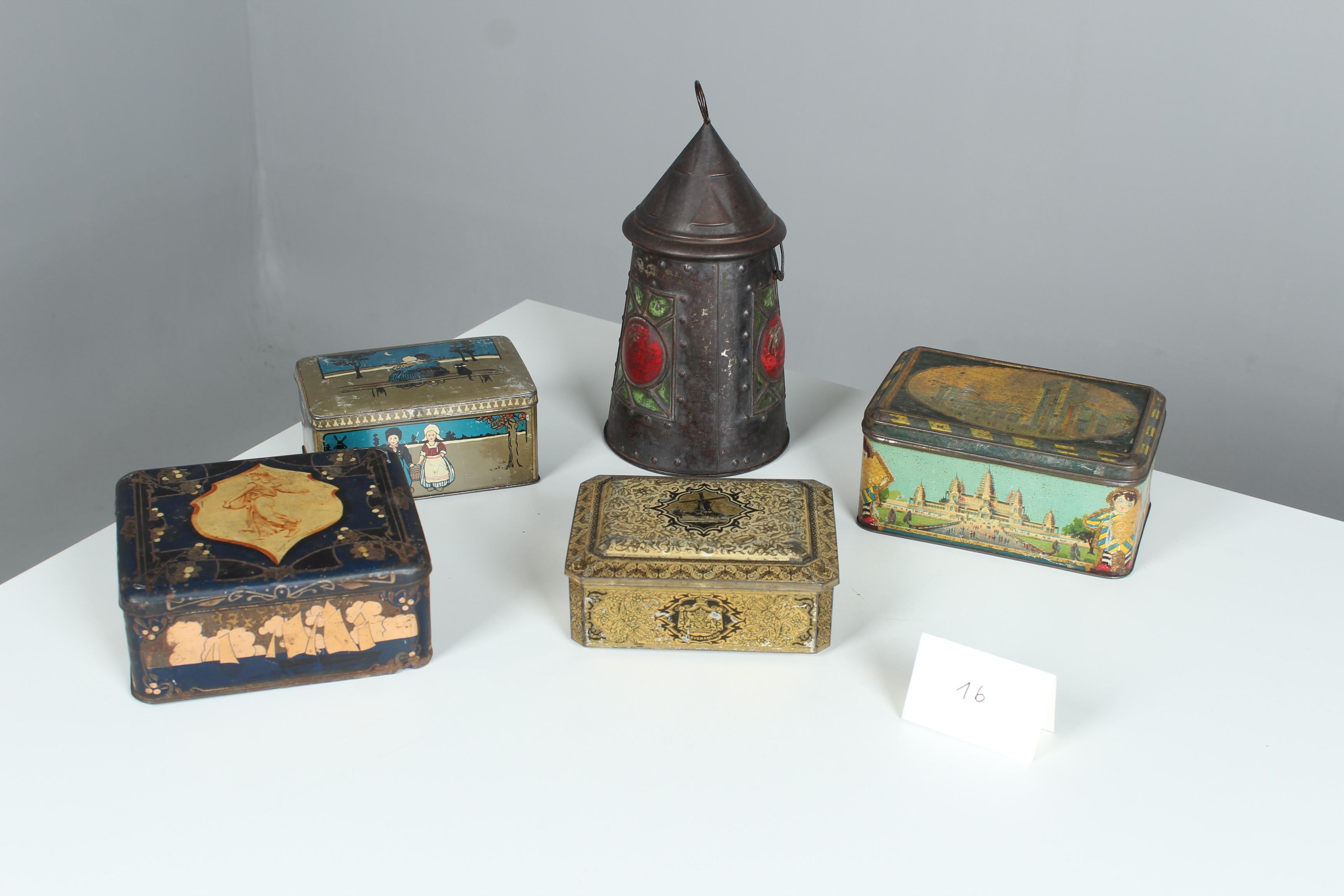 Set of 5 antique tin cookie cans from France.

