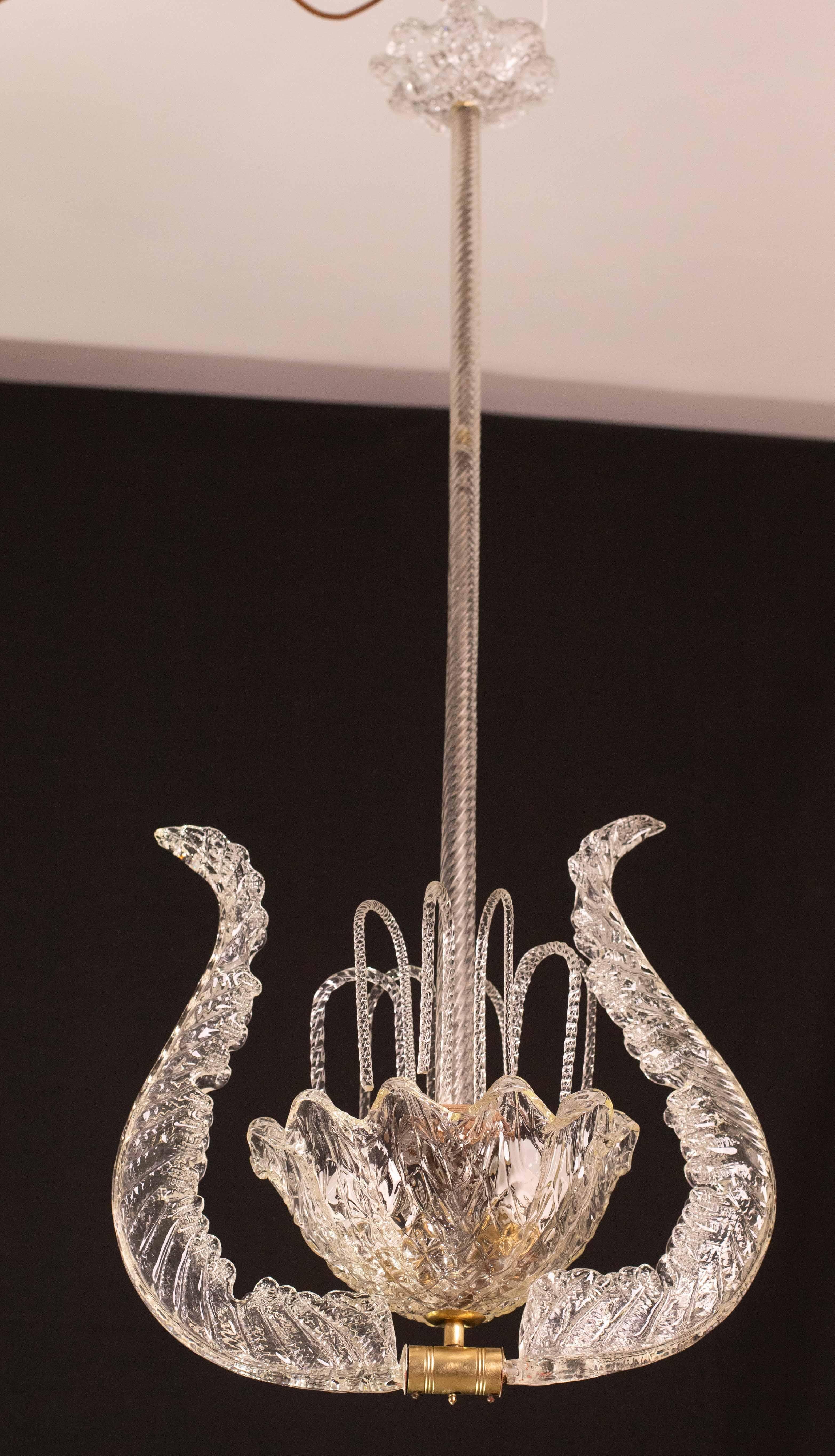 Set of 5 Stunning Elegant chandelier attributed to the Barovier e Toso glassworks.

Design period: 1930\1950.

The chandeliers consists of a long central element, a glass bowl decorated with two leaves and filled with glass descending.

The glass