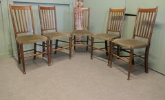 Set of 5 Arts and Crafts Golden Oak Dining Chairs This is a very handsome set