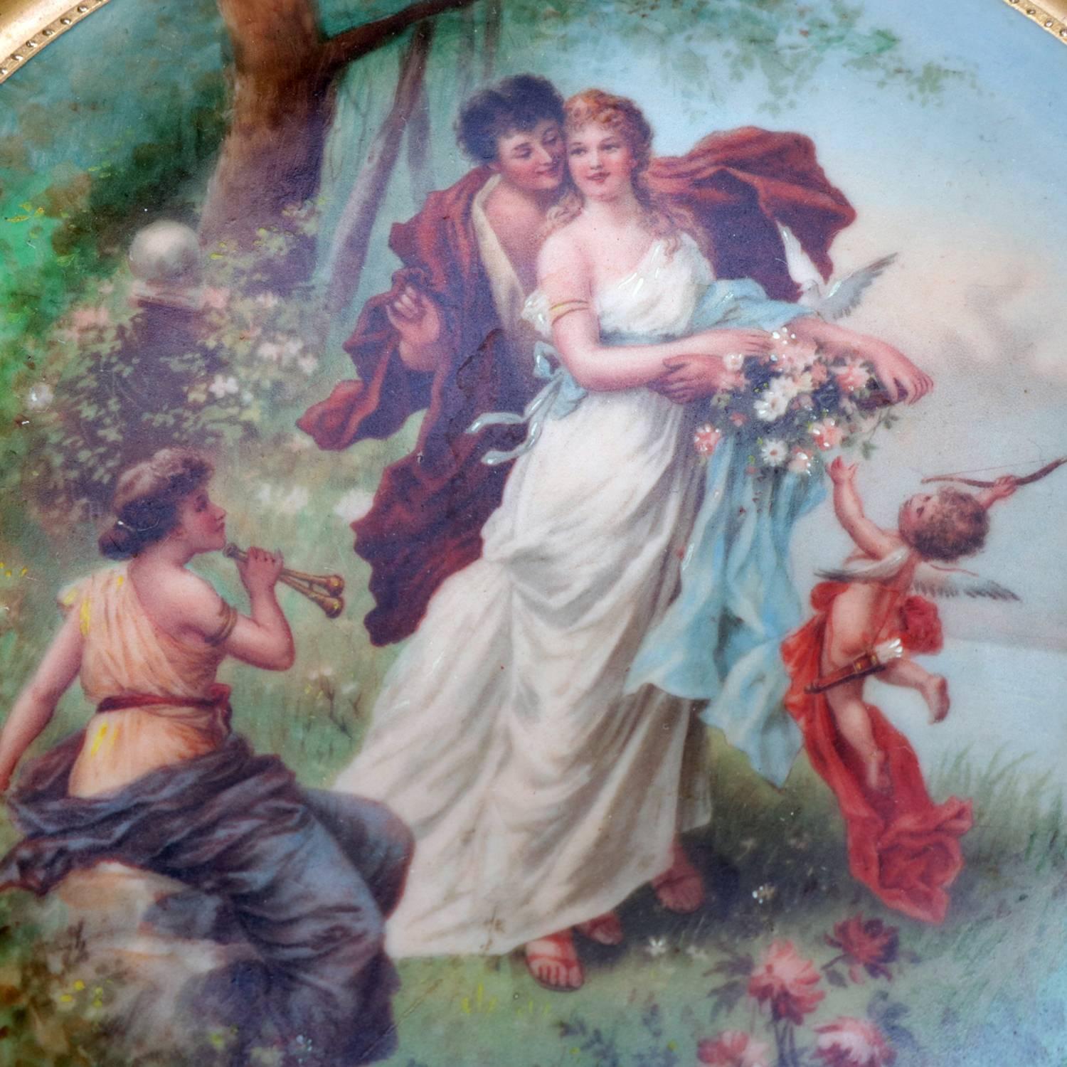 Set of five hand-painted and gilt Vienna porcelain marriage plates feature various classical countryside courting scenes, gilt highlights throughout, en verso blue beehive and R.F. St Made in Vienna Austria, titled 