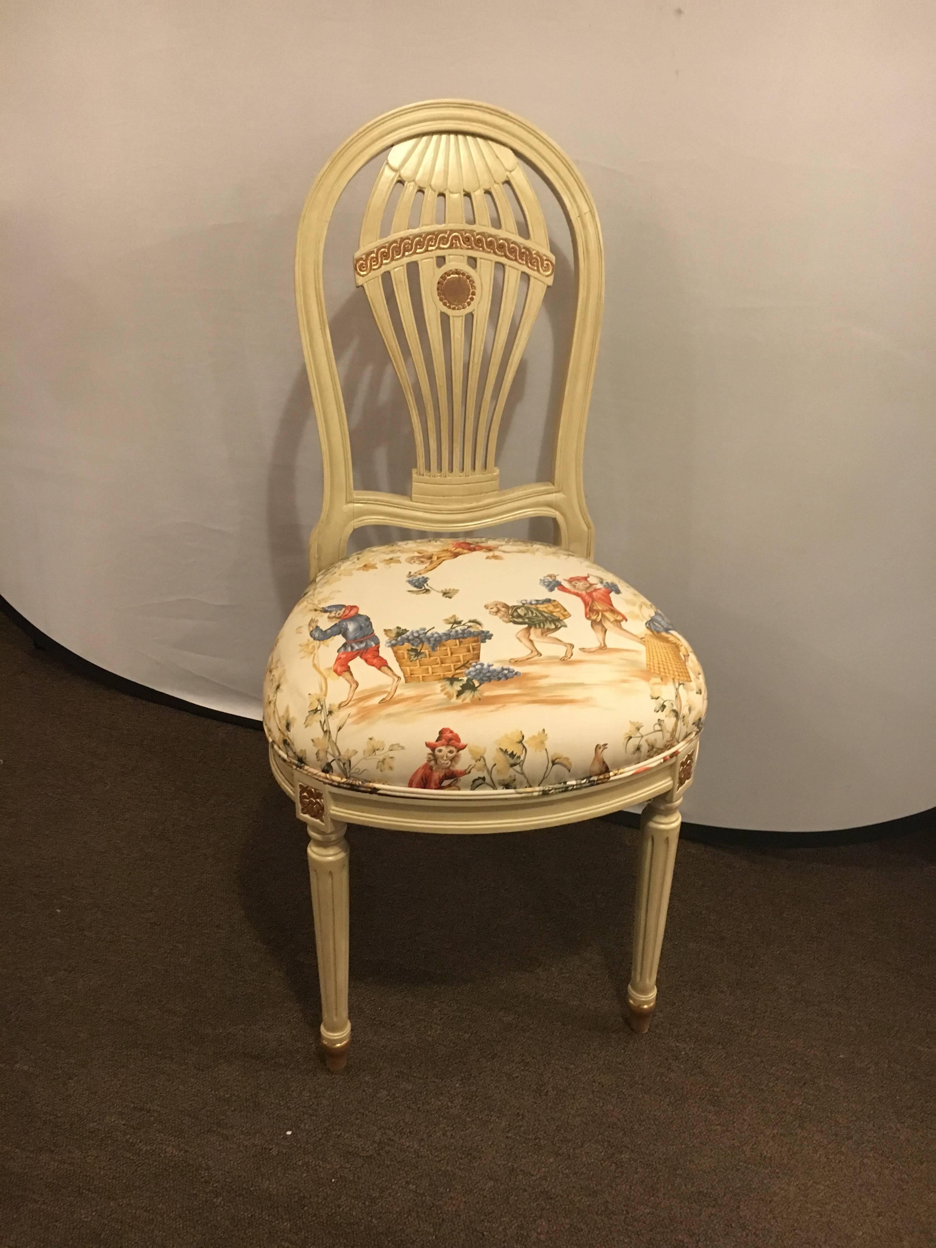 Set of 5 dining chairs by Maison Jansen. This fine set of paint decorated dining chairs bring new meaning to the Hollywood Regency Era. Having been recently paint decorated with gilt hi lights this set ebonies the style and influence which once