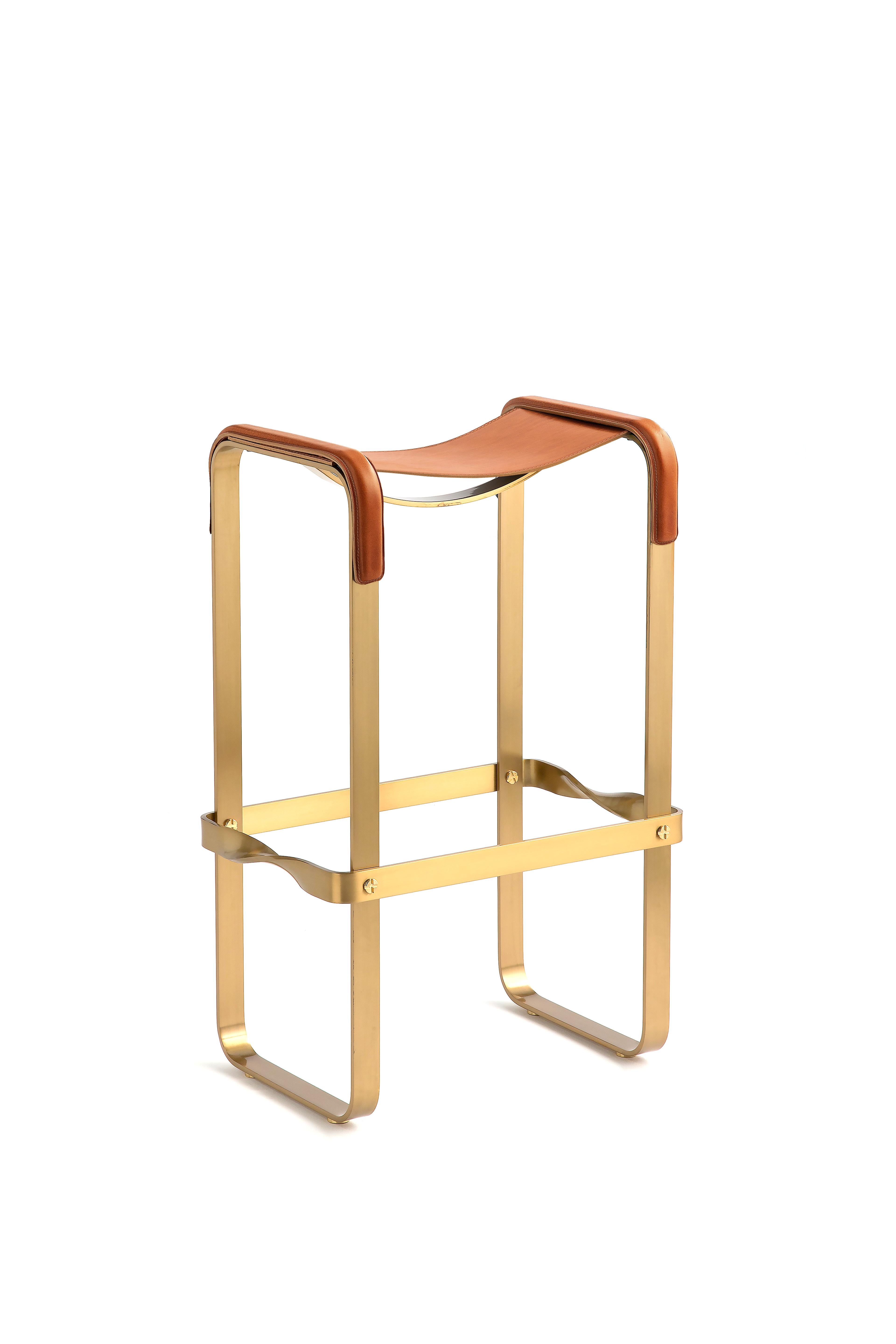 The Wanderlust contemporary barstool belongs to a collection of Minimalist and serene pieces where exclusivity and precision are shown in small details such as the hand-turned metal nuts and bolts that fix the leather surfaces, that go unnoticed at