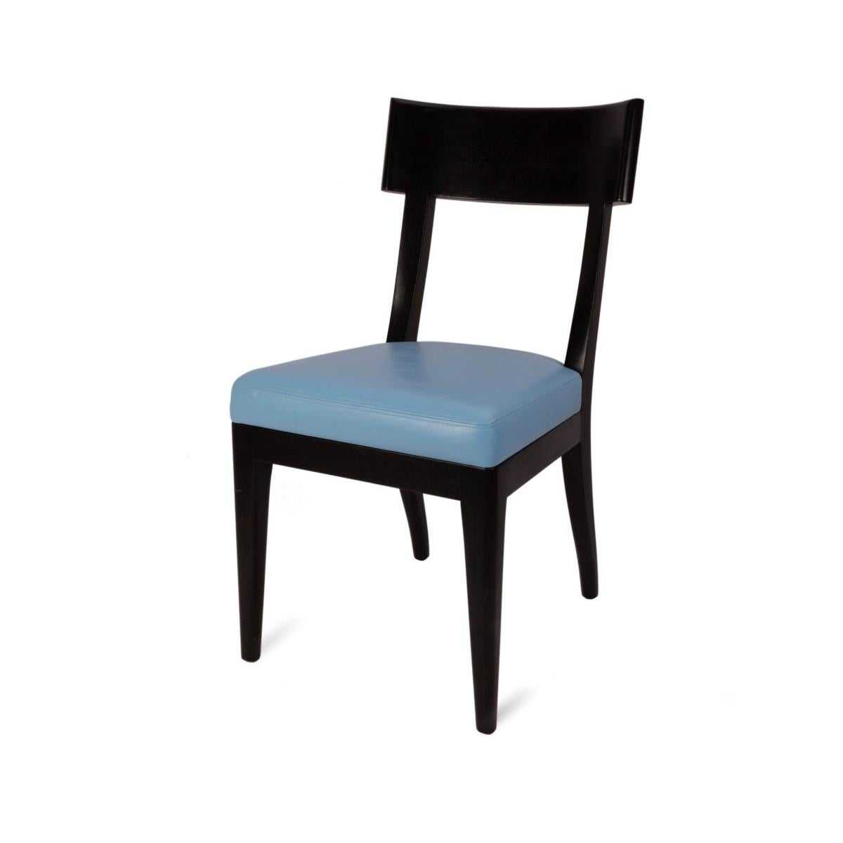 Set of five (5) Terra dining chairs by Christian Liaigre for Holly Hunt in a pale blue leather and dark brown finish. 

Some wear to frames and upholstery,

Measure: Seat height 18 inches.