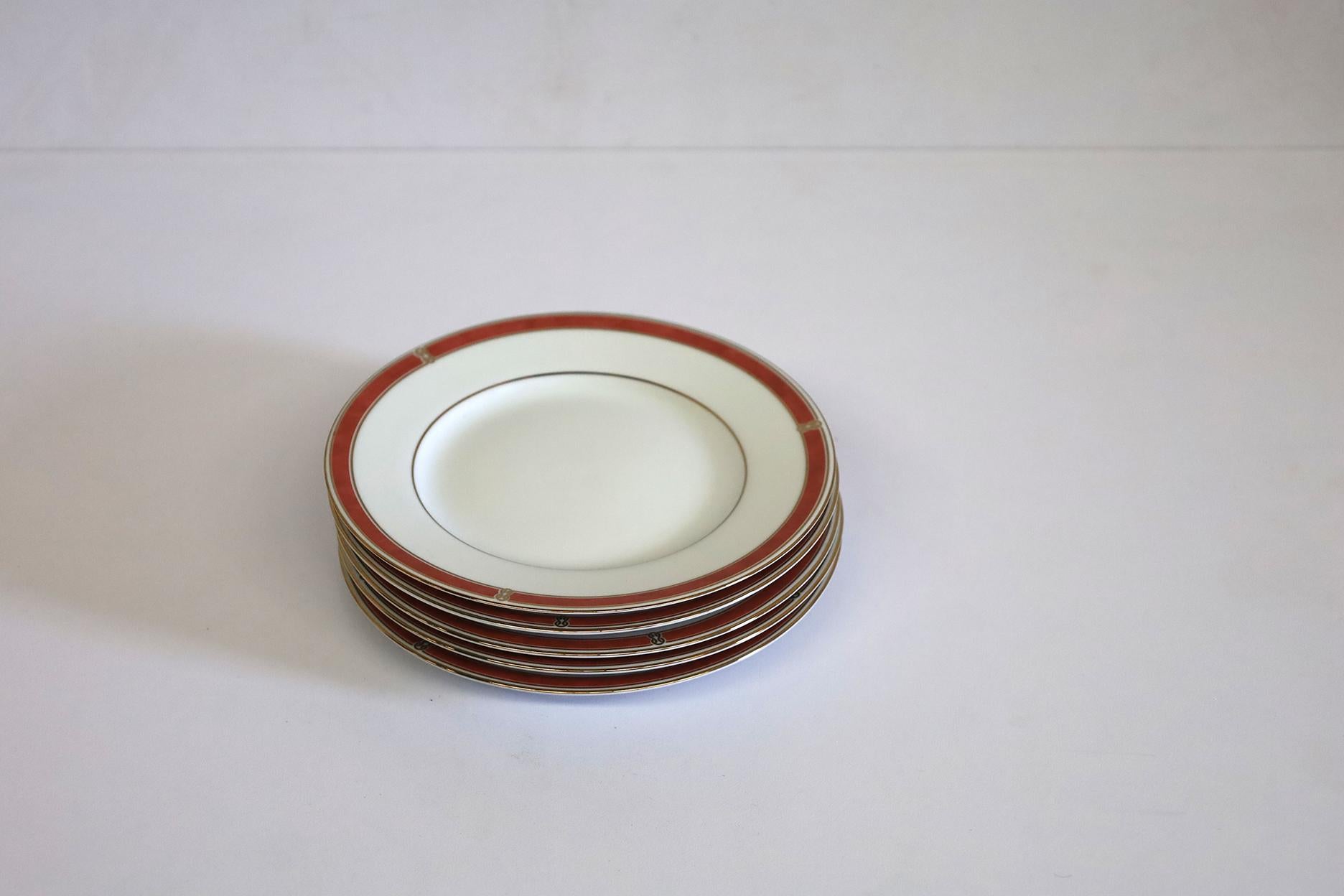 Set of 5 Christofle Oceana Rouge Bread Plates like new.
