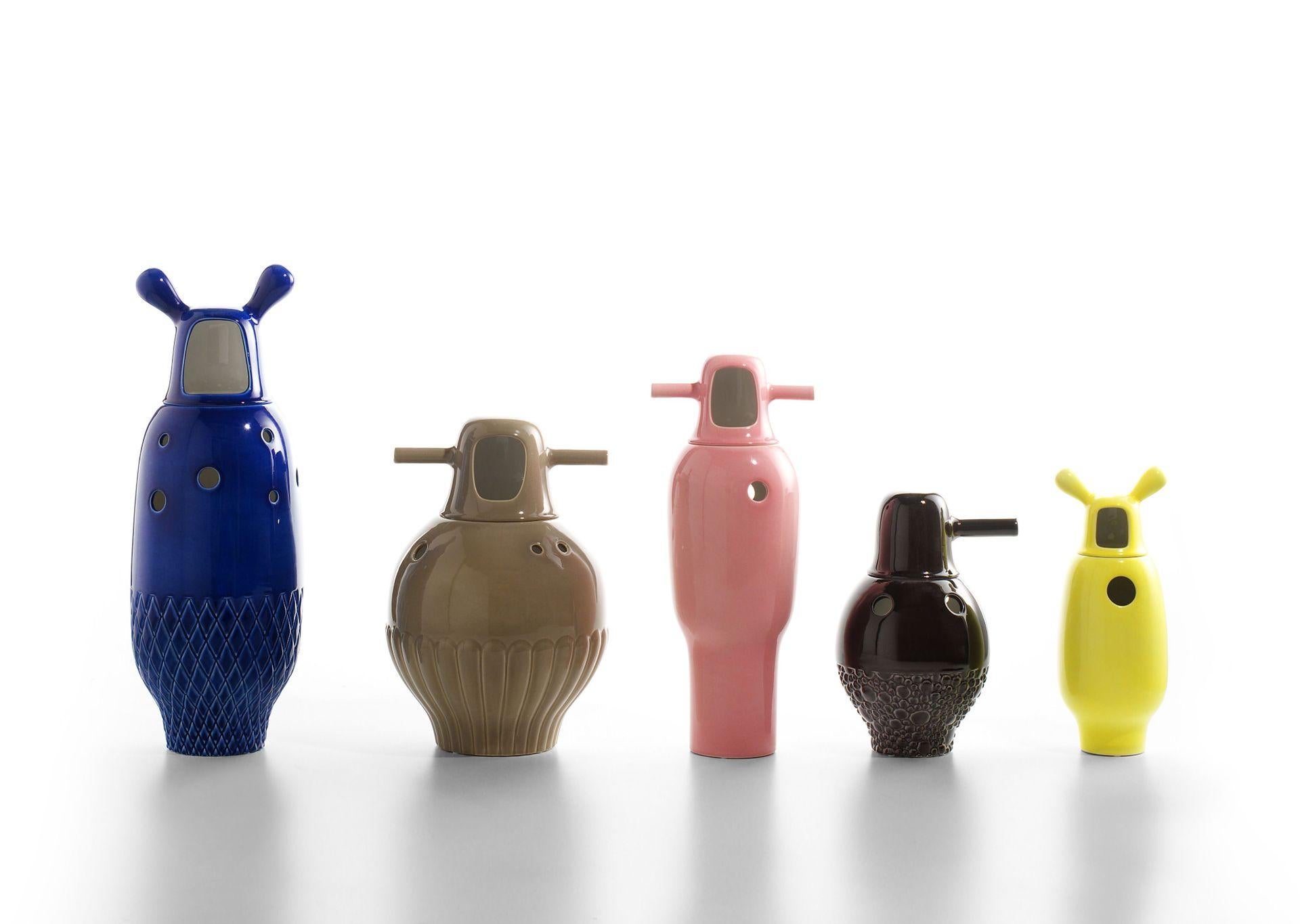Set of colored showtime vases by Jaime Hayon 
Dimensions: D19 x H33, D31 x H34, D27 x H47, D21 x H48, D23 x 59 cm
Materials: Made in two pieces in enameled stoneware porcelain; monocolour (interior and external in white) or bicolor (interior in
