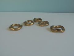 Set of (5) Curvy Brass Napkin Ring Holders