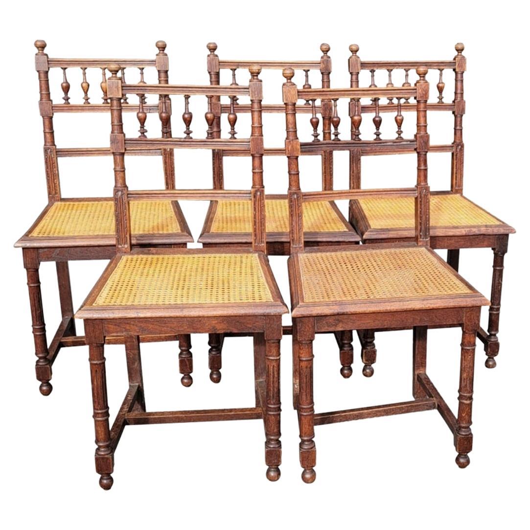 Set of 5 Early 20th C. French Henry II Oak and Canned Seat Dining Chairs For Sale