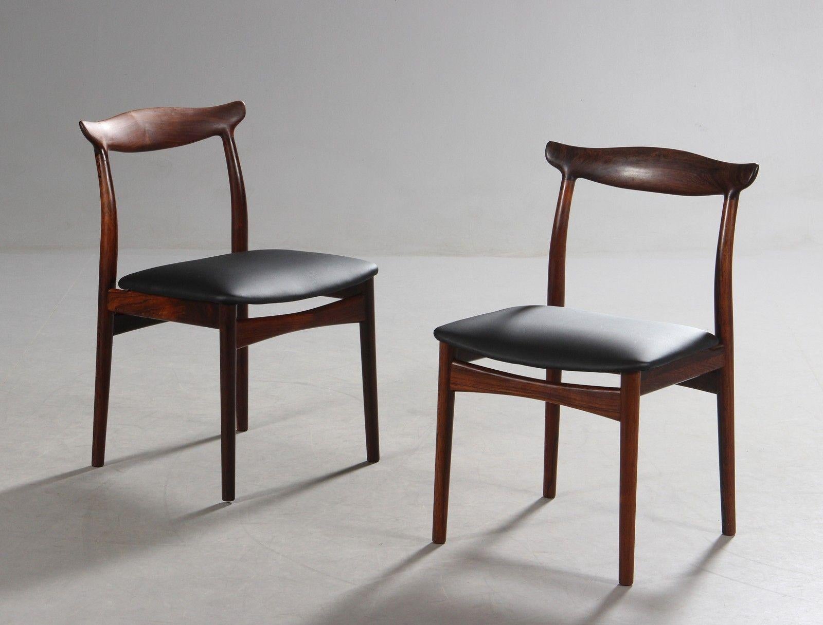 Set of 4 Erik Worts Rosewood Dining chairs. Wonderful Sculptural Design. Produced by Varmo. See Varmo signature on bottom. Last photo shows 1960 catalog with these chairs.  NOTE:  THIS IS A SET OF 4 CHAIRS.