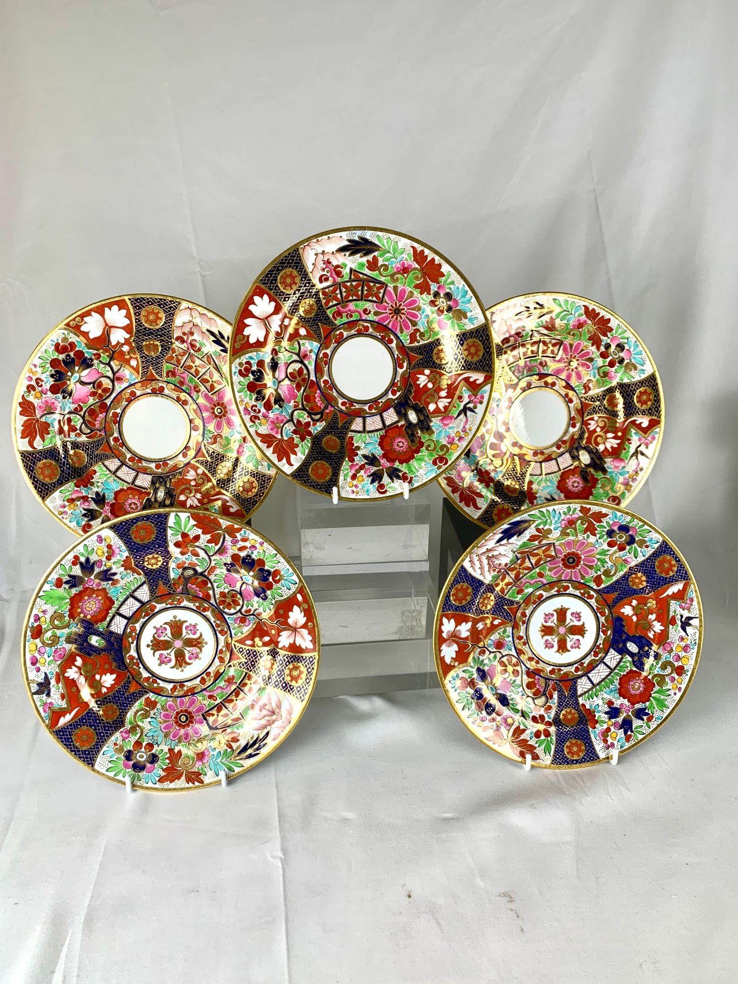 Despite my poor photographic skills, the plates are all perfectly round.
This vibrant set of five antique English porcelain plates was hand-painted by Barr Flight Barr at the Worcester factory between 1807 and 1813.
The decoration is exuberant and