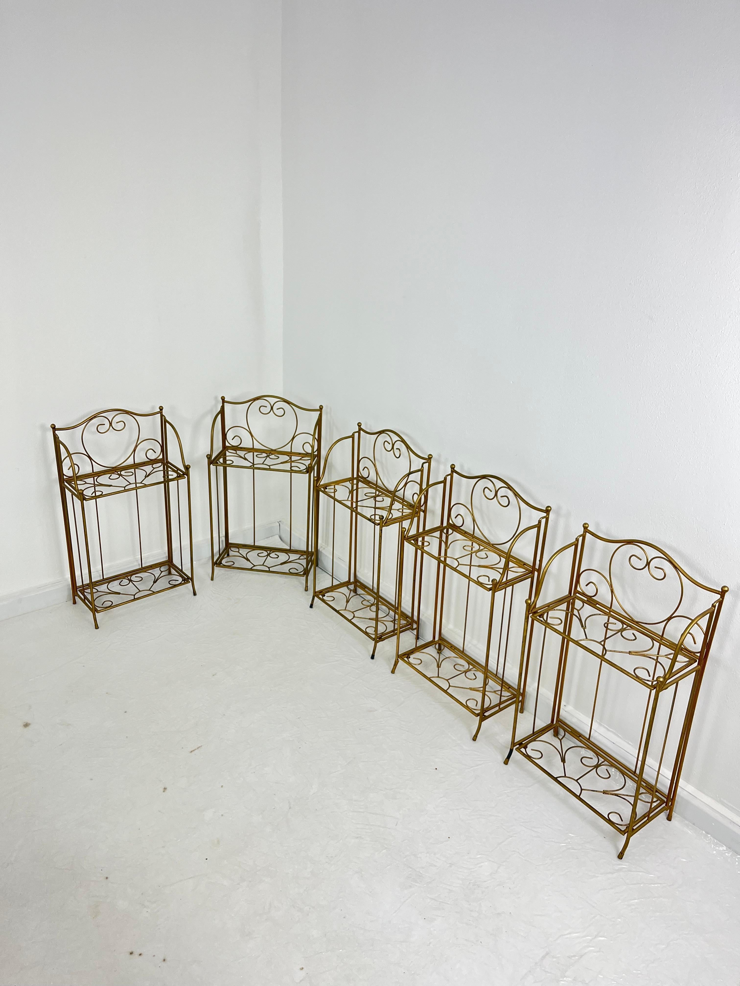Set of 5 folding gilded iron planters/pot holders, 1960s
Intact and in good condition.
They could also be used as small bookcases.