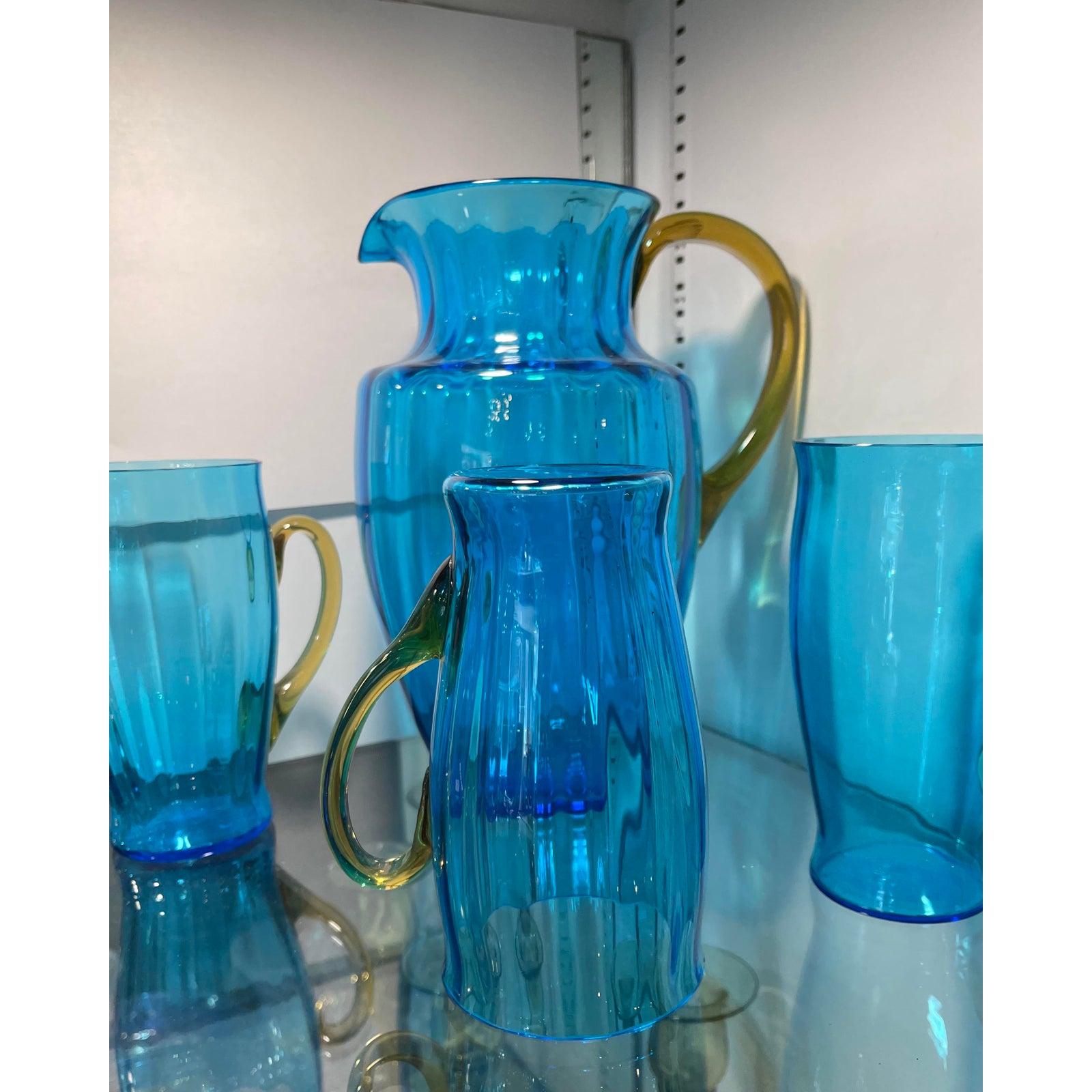 Rare Carder Steuben Blue Glass Iced Tea Pitcher Handled Tumbler Mug Set. Includes pitcher and 4 handle tumblers

Additional information:
Materials: Glass
Color: Blue
Brand: Steuben Glass
Period: 1930s
Styles: Mid-Century Modern 
Item Type:
