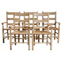 Ensemble de 5 chaises de salle à manger de style provincial français en chêne sculpté avec sièges en osier