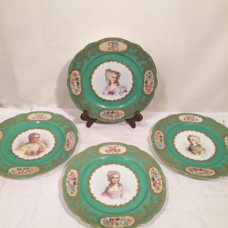 Set of five French Sèvres portrait plates, each painted with different ladies of the French court, artist signed Maglin. They are from 1837. Each plate has a raised gold monogram which is the monogram of the lady on the plate with three cartouches