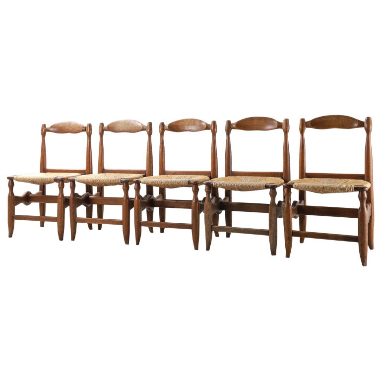  Guillerme et Chambron  Set of 5 Oak and Rush Chairs, 1960–69, offered by Thurstan