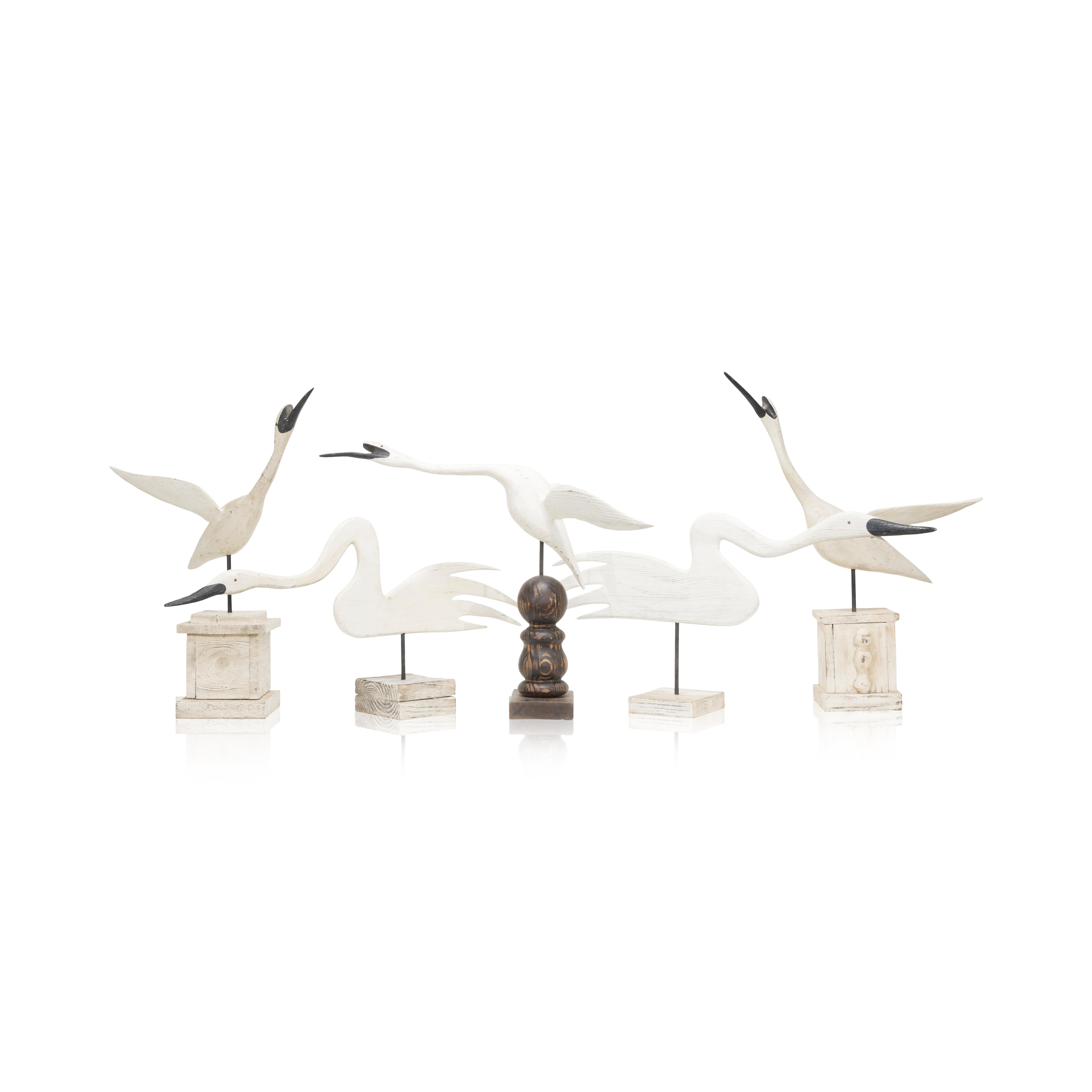 Flock of Wayne Baker (Virginia) shorebird decoys. Painted wood consisting of two schematic swans and three flying egrets painted in the round. Each is mounted to a wooden base. Signed on the underside by the carver.

Origin: Virginia
Period: Last