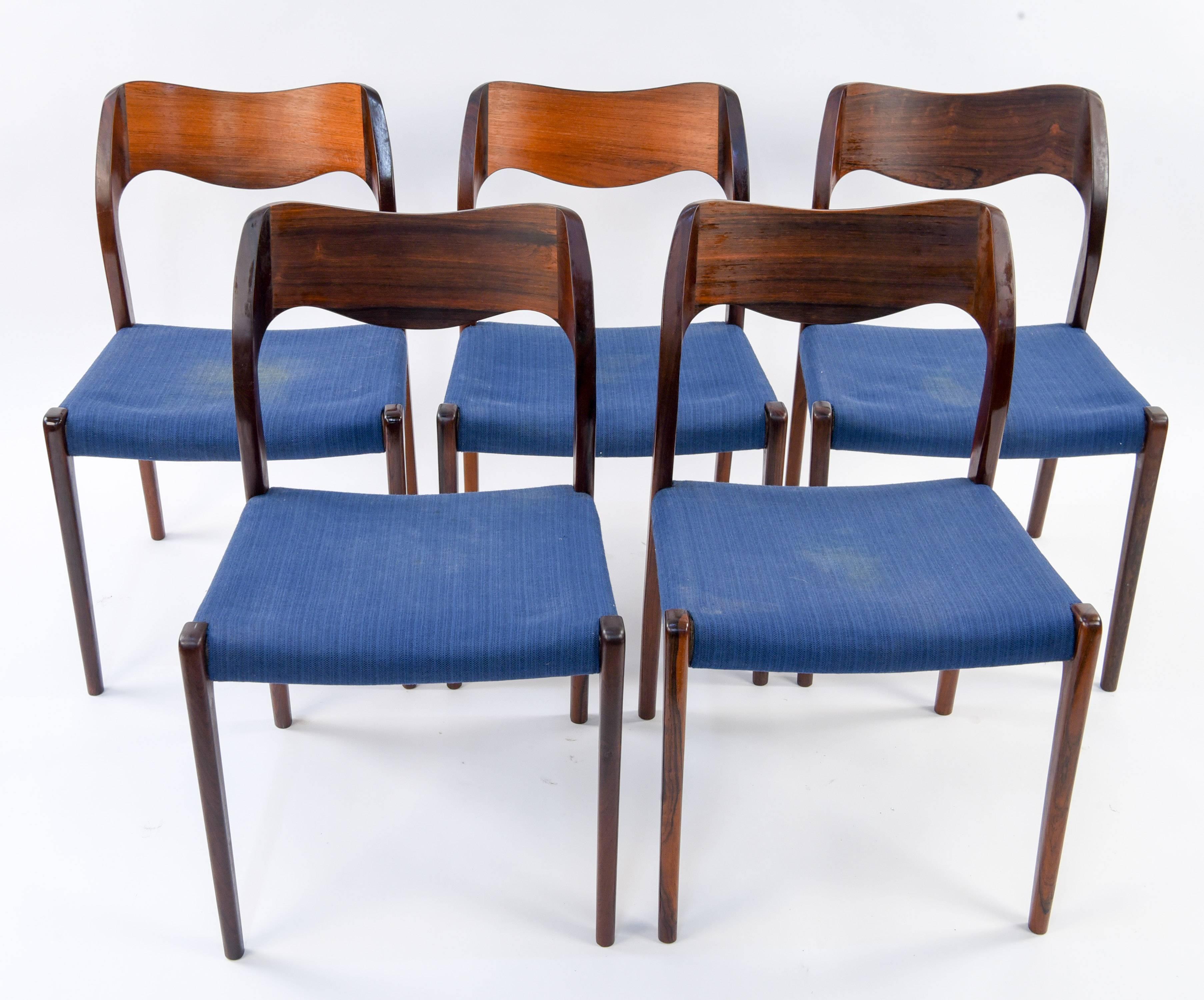 This is a wonderful set of five dining chairs produced by J.L. Møller, model no. 71 , designed by Arne Hovmand Olsen. Beautiful curved form for the backrests. A great example of Danish mid-century design, circa 1960s.
