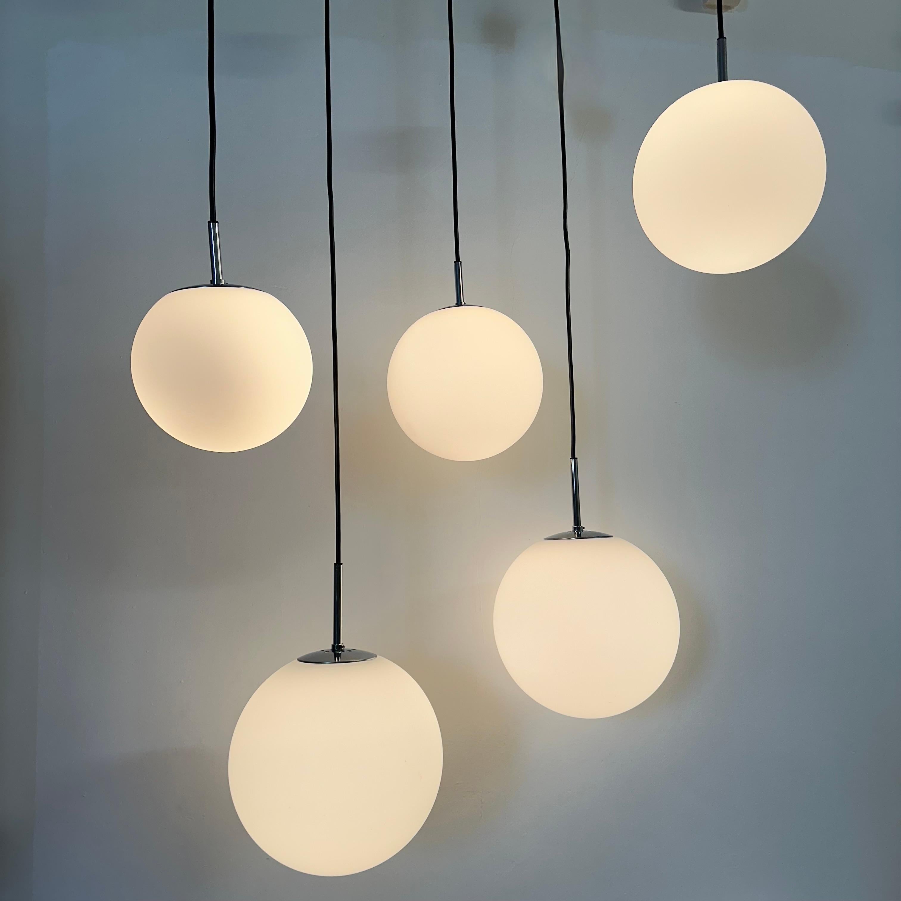 Set of 5 Limburg Glashutte hanging lamp matte opaline globe , 1970s

Material: Glass , chrome
Condition: Good. chrome has some corrosion