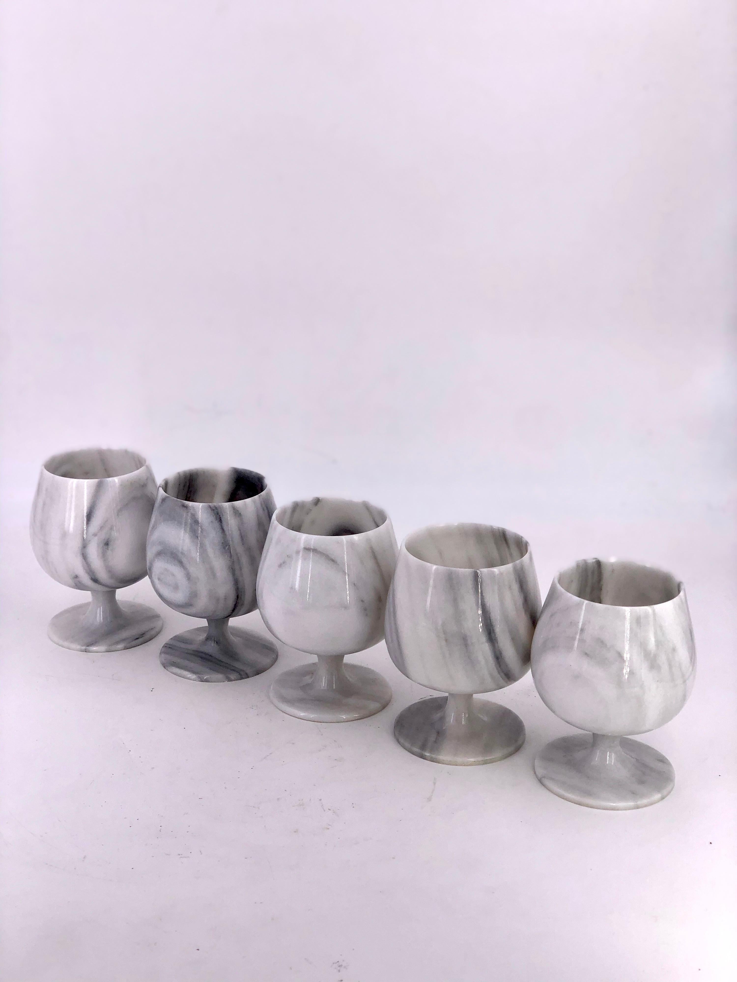 A great set of solid marble footed goblets these are beautiful no chips or cracks, great design thin marble delicate one piece.