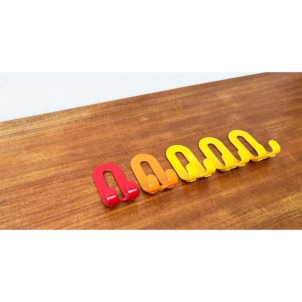 Mid-Century German Space Age Coat Hooks, 1960s, Set of 5, in Very Good conditions. Designed 1960 to 1969.

Additional information:
Materials: Metal
Color: Orange
Styles: Mid-Century Modern
Country of Origin: Germany
Item Type: Vintage, Antique or