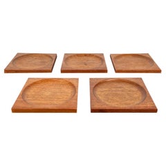 Juego de 5 posavasos de teca de mediados de siglo, años 60
