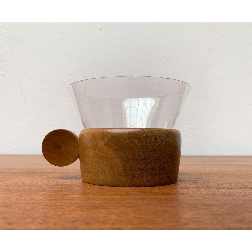 Set di 5 bicchieri da tè in legno di metà secolo, anni '60, in ottime condizioni. Progettato dal 1960 al 1969.

Informazioni aggiuntive:
Materiali: Vetro, Wood
Stili: Medioevo Moderno
Colore: marrone
Tipo di articolo: Vintage, Antico o