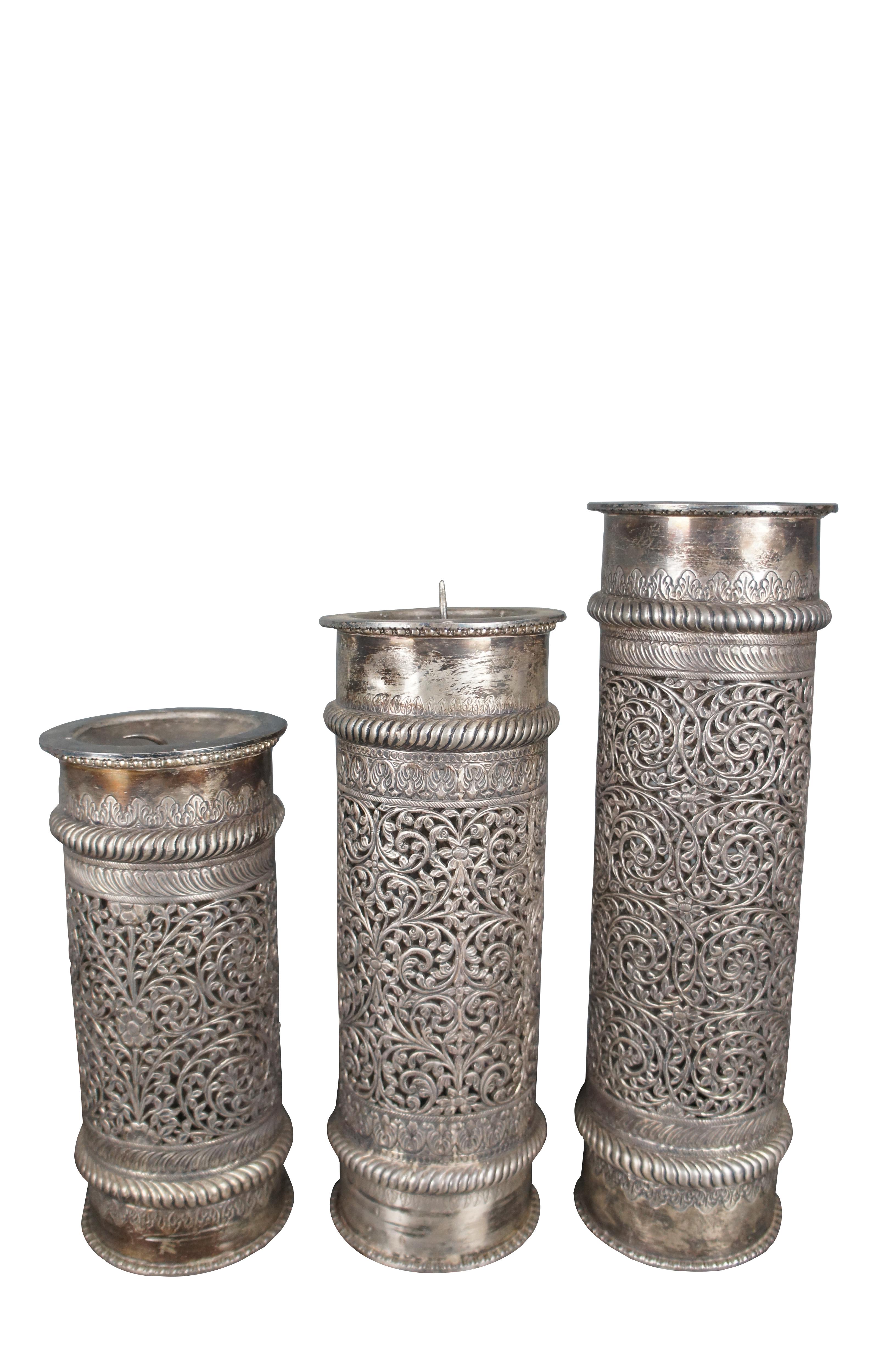 5 Moroccan Reticulated Silver Candle Holder. Tops remove allowing for interior use

Dimensions:
4.25