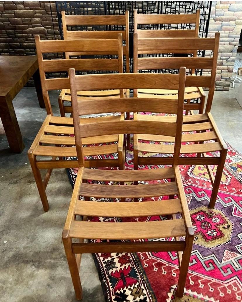 Set of 5 Kurt Østervig for KP Mobler oak slatted dining chairs, circa 1970s, Denmark. These Danish modern dining chairs are in good overall condition. 
Dimensions: 19.70