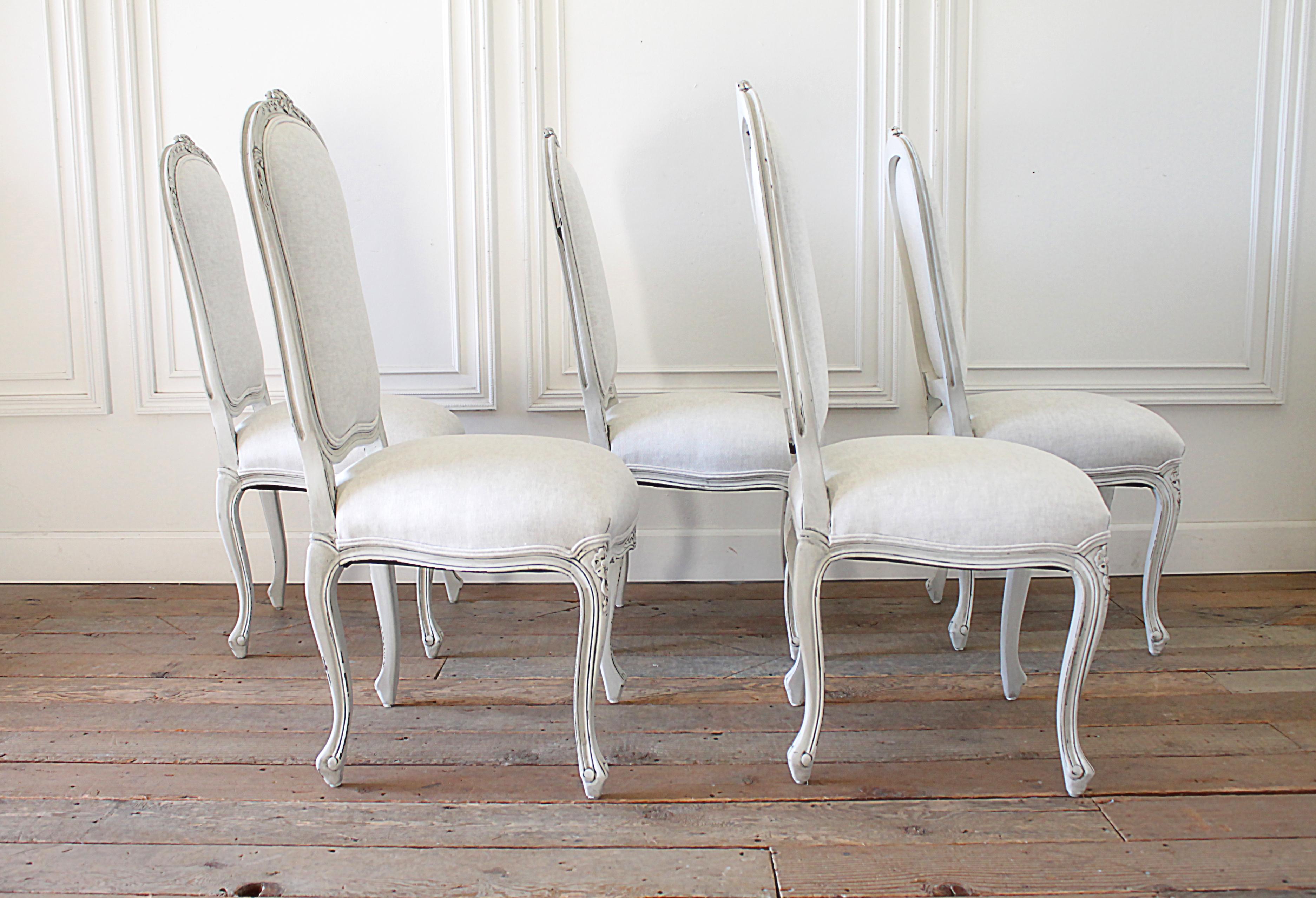 white upholstered dining room chairs