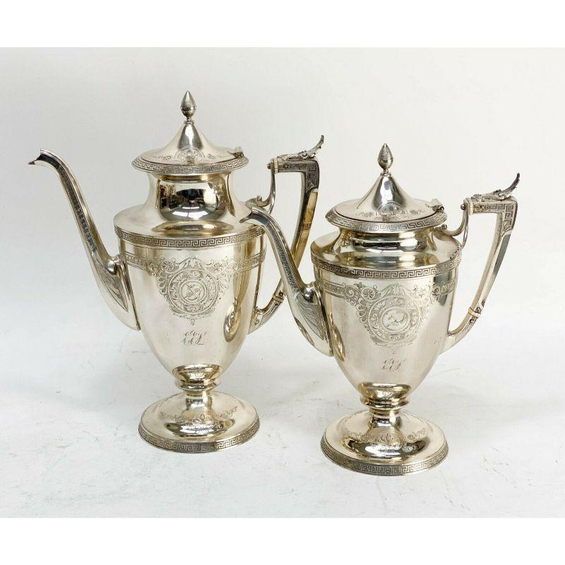 Set of 5 piece Gorham coin silver tea and coffee set, circa 1870

5 Piece Gorham coin silver tea & coffee set, circa 1870. Set includes coffee pot, teapot, lidded sugar bowl, creamer, and waste bowl. Impressive hand-engraved details to each piece
