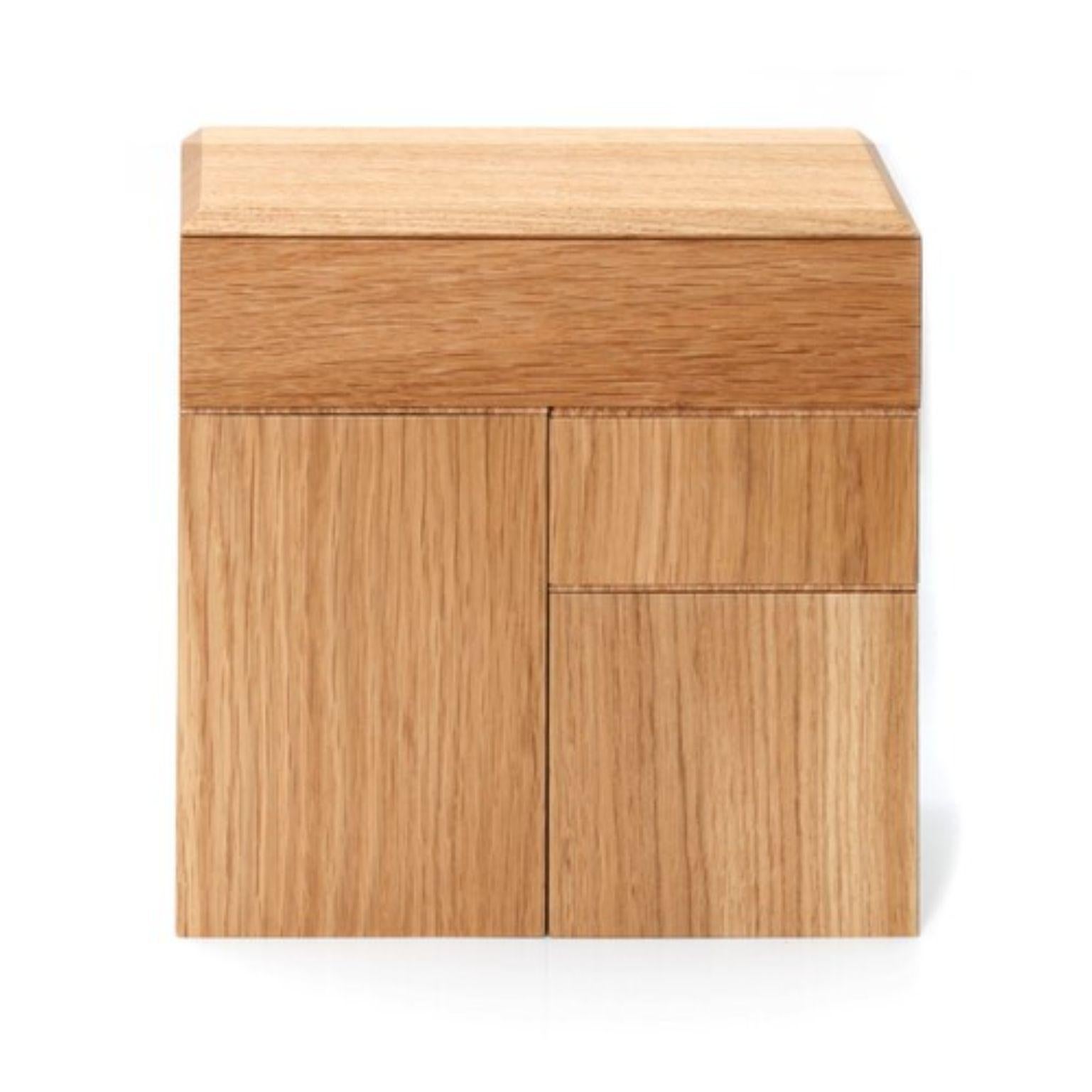 Set of 5 pino boxes by Antrei Hartikainen
Materials: Oak, natural oil wax
Dimensions: D 9, W 9, H 5 / 9,5 / 14cm

A set of three vertical and two horizontal stacking boxes constructed of vividly grained woods. The pino boxes may be arranged in
