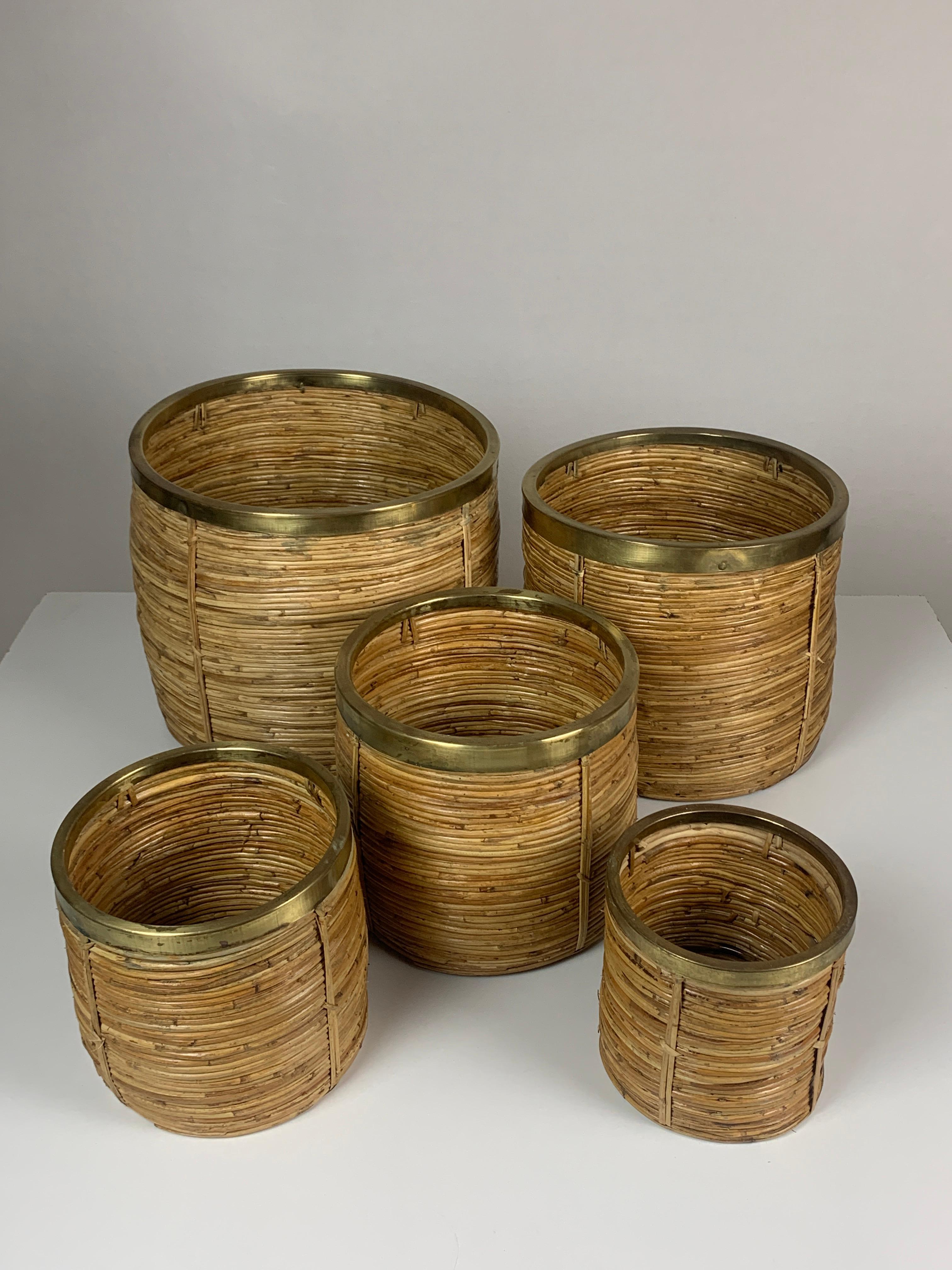 Brass Set of 5 rattan pencil reed and brass plant holder baskets, Italy 1970s