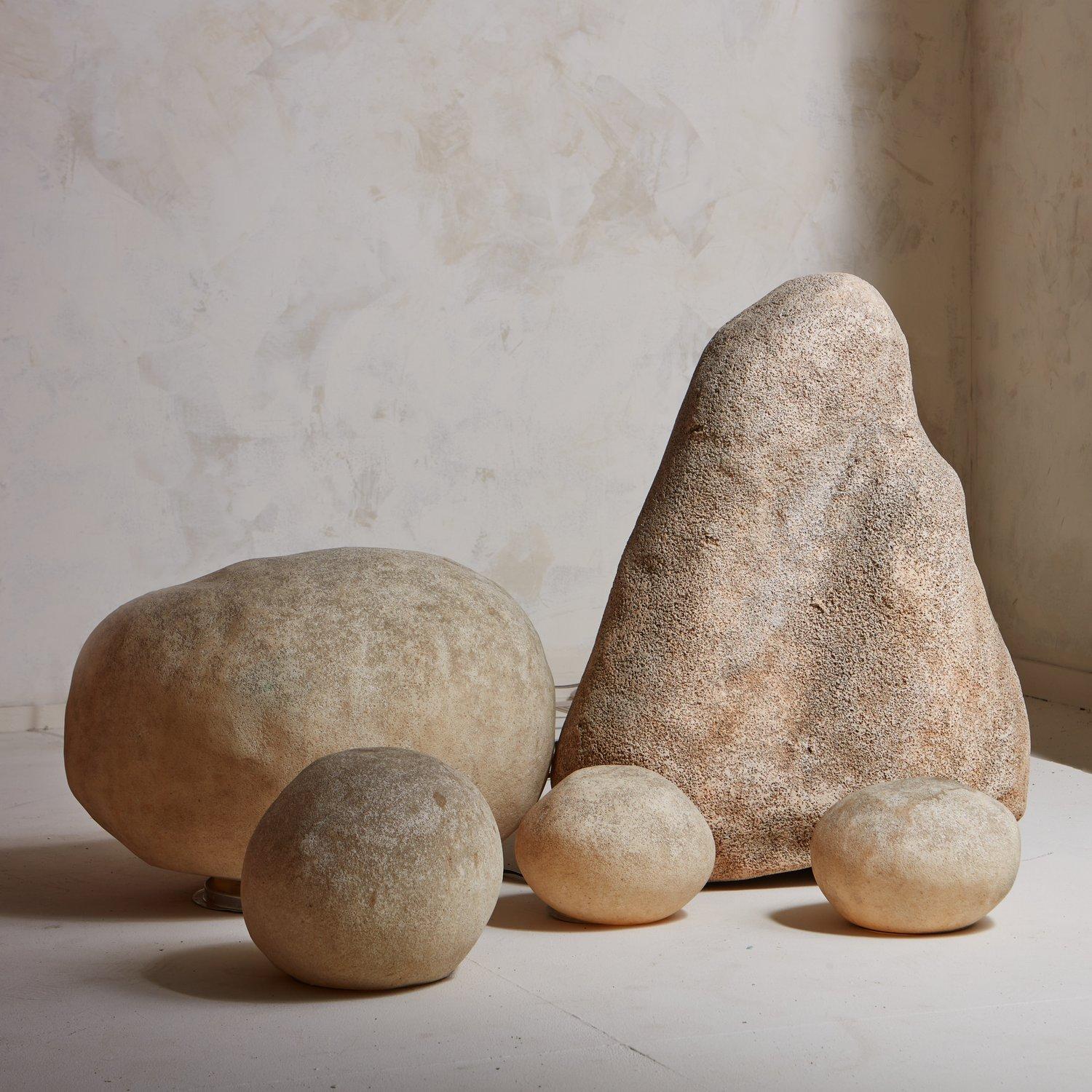 A set of 5 rock lamps designed by Andre Cazenave (1928-2003) in the late 1960s. These lamps were made from resin and marble powder and designed to emulate an oversized pebble. We love the textural finish and realistic detailing on these beauties.