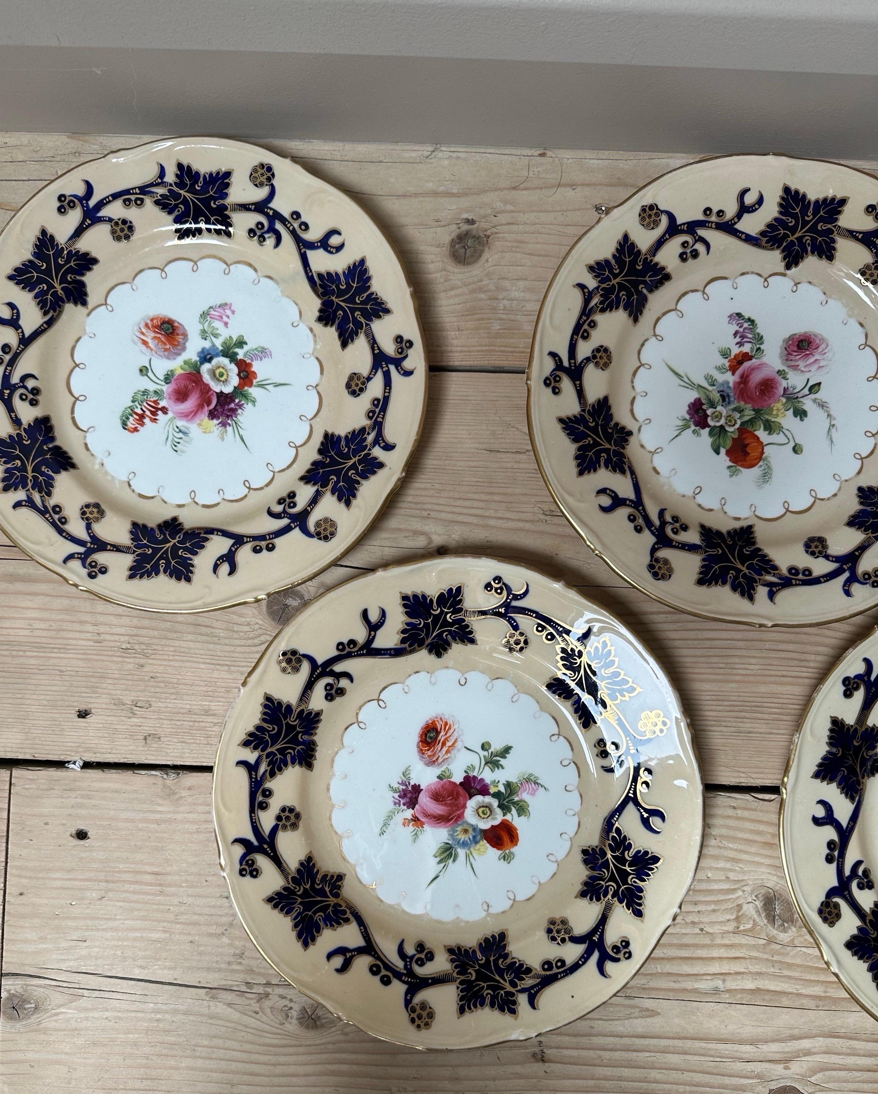 The image shows a plate that appears to be Rockingham porcelain, specifically a Regency-era plate from the Rockingham Works in Swinton, Yorkshire, England. 

Here's why and some details about it:
* Distinctive Style: The plate features