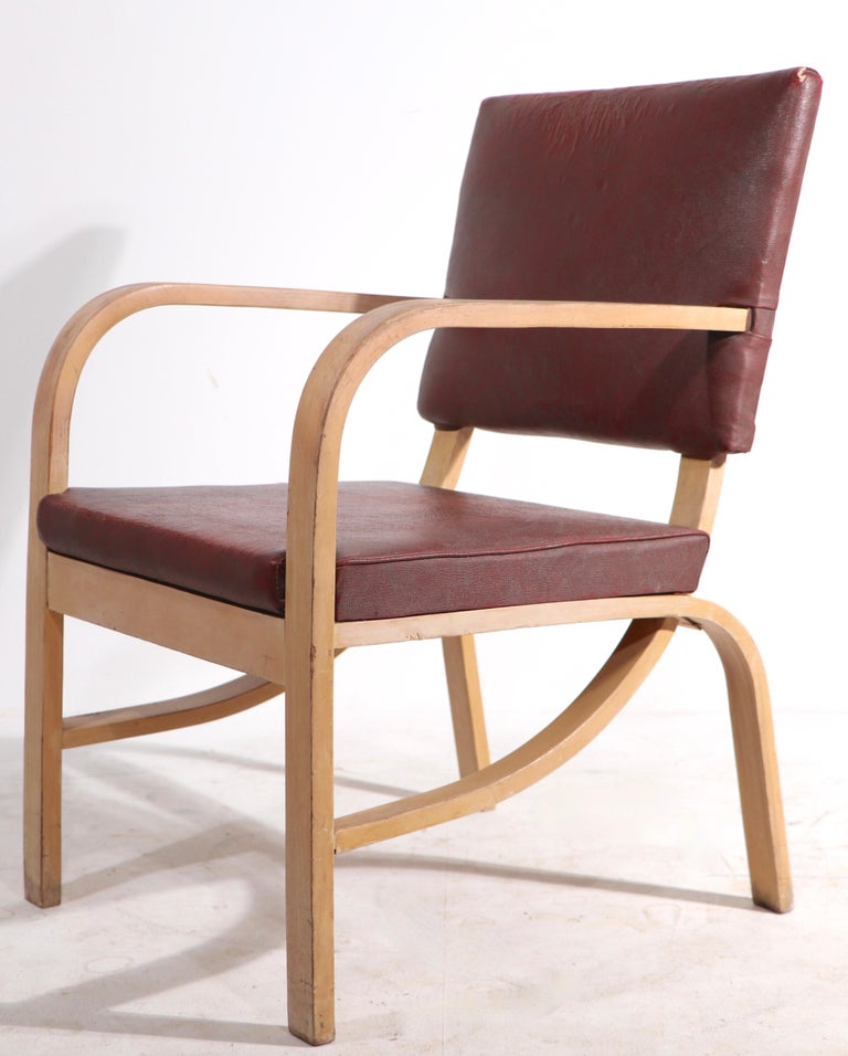 Rare early set of Art Deco dining chairs, designed by Gilbert Rohde for Heywood Wakefield. This set includes four side, or armless chairs, and one arm chair. This model is hard to find, and almost never appears on the market as a group, or set.
All