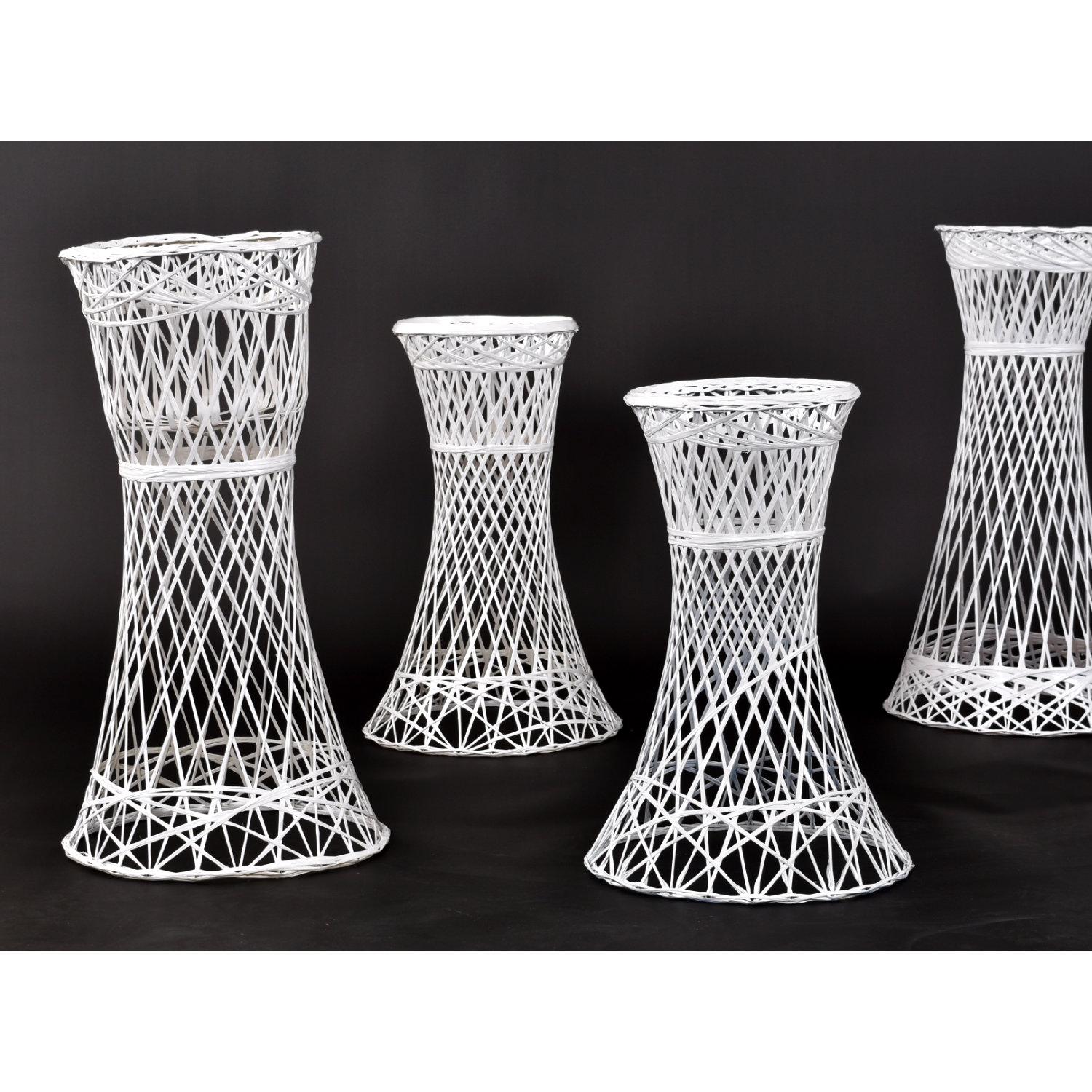 Rare opportunity to buy a stable of Russell Woodard vintage spun fiberglass planters. This group of 5 planters have been beautifully restored with all new white enamel paint. The durable spun fiberglass planters are intended for outdoor use. The