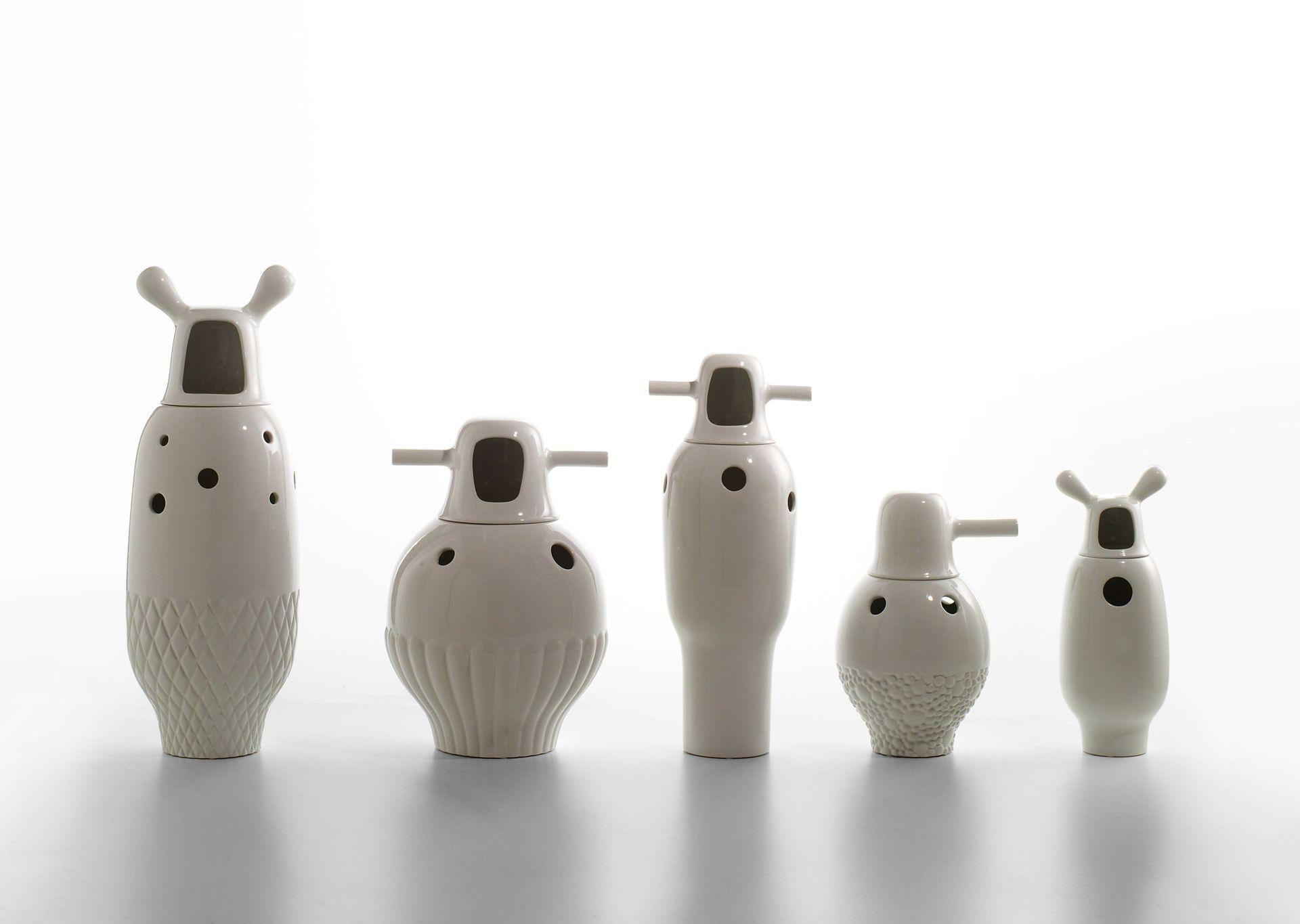 Set of showtime vases by Jaime Hayon 
Dimensions: D 19 x H 33, D 31 x H 34, D 27 x H 47, D 21 x H 48, D 23 x 59 cm
Materials: Made in two pieces in enameled stoneware porcelain; monocolour (interior and external in white) or bicolor (interior in
