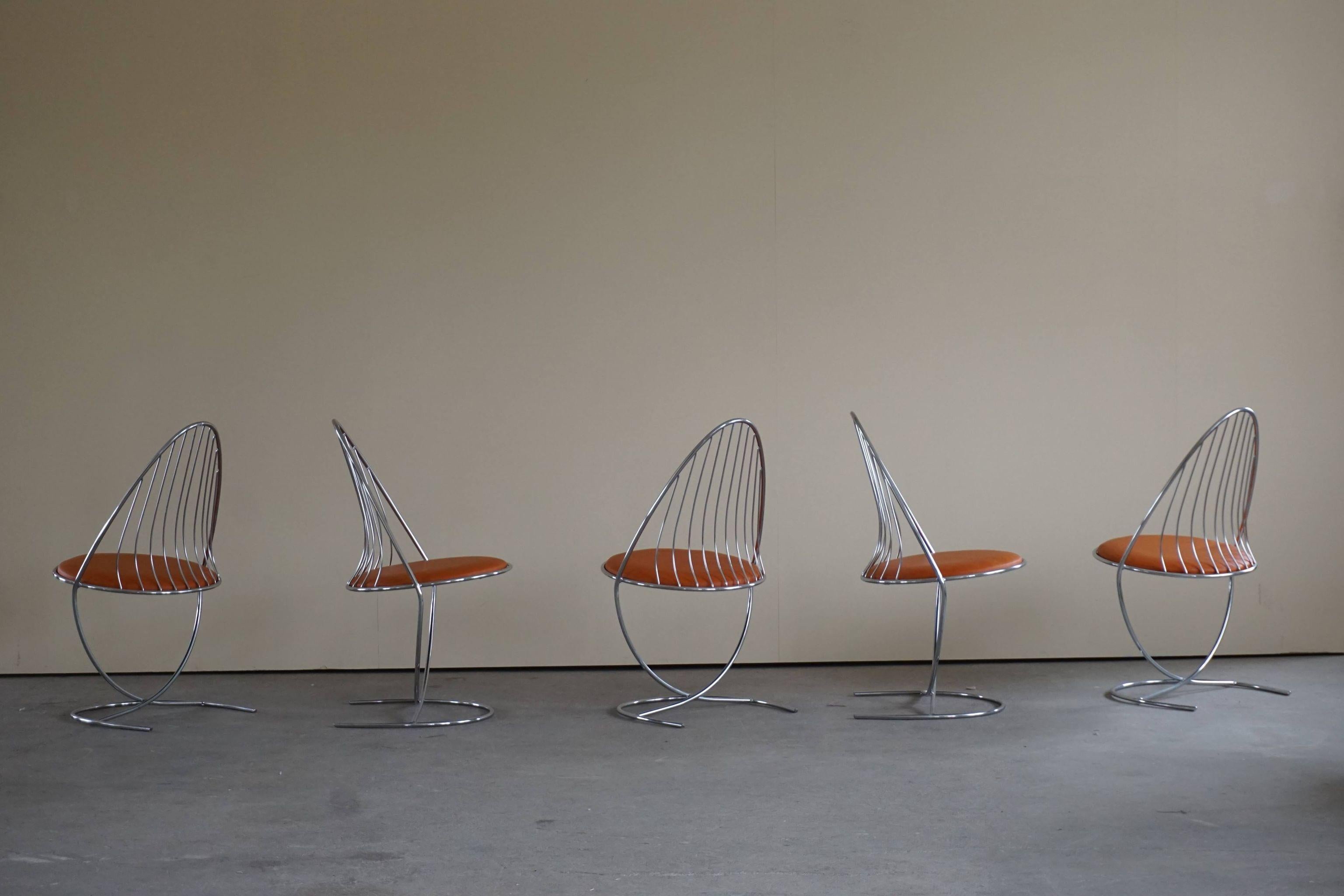 Set of 5 swedish mid century dining chairs in chrome and reupholstered seats in semi anilin leather, made by Dahlens Dalum, 1960s.

The chairs are stackable and in a overall good vintage condition.