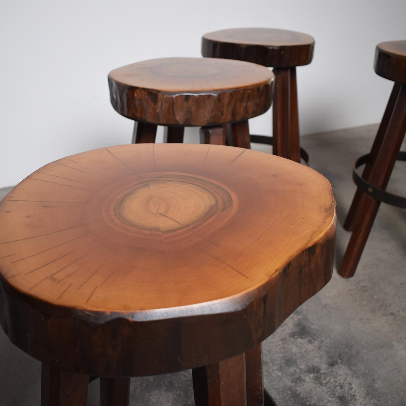 Set of 5 Unique Rustic Artisan Brutalist Tree Trunk Bar Stools 1960s 
Amazing thick and heavy hand made bar stools with thick seats.