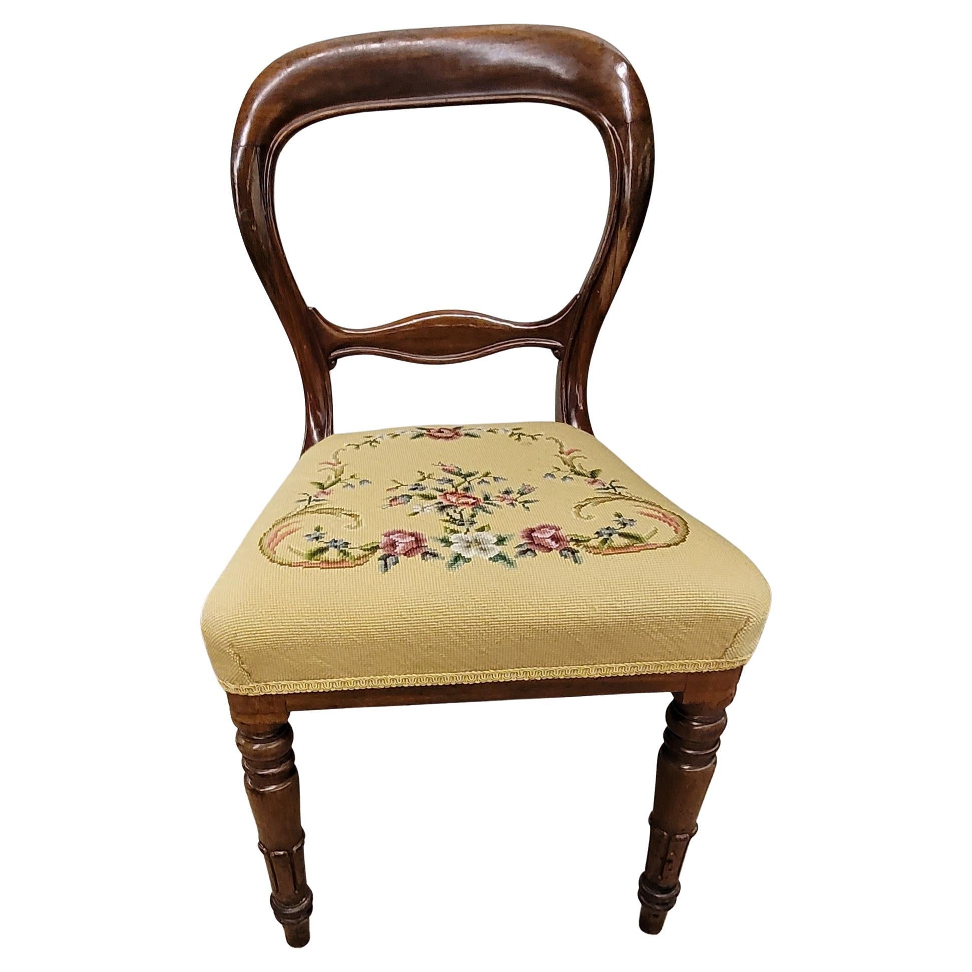 A beautiful set of five Victorian Mahogany and custom needlepoint upholstered side chairs in great condition. Chairs have been recently refinished and seat redone with new custom needlepoint work for each individual chair. The chairs look fabulous.