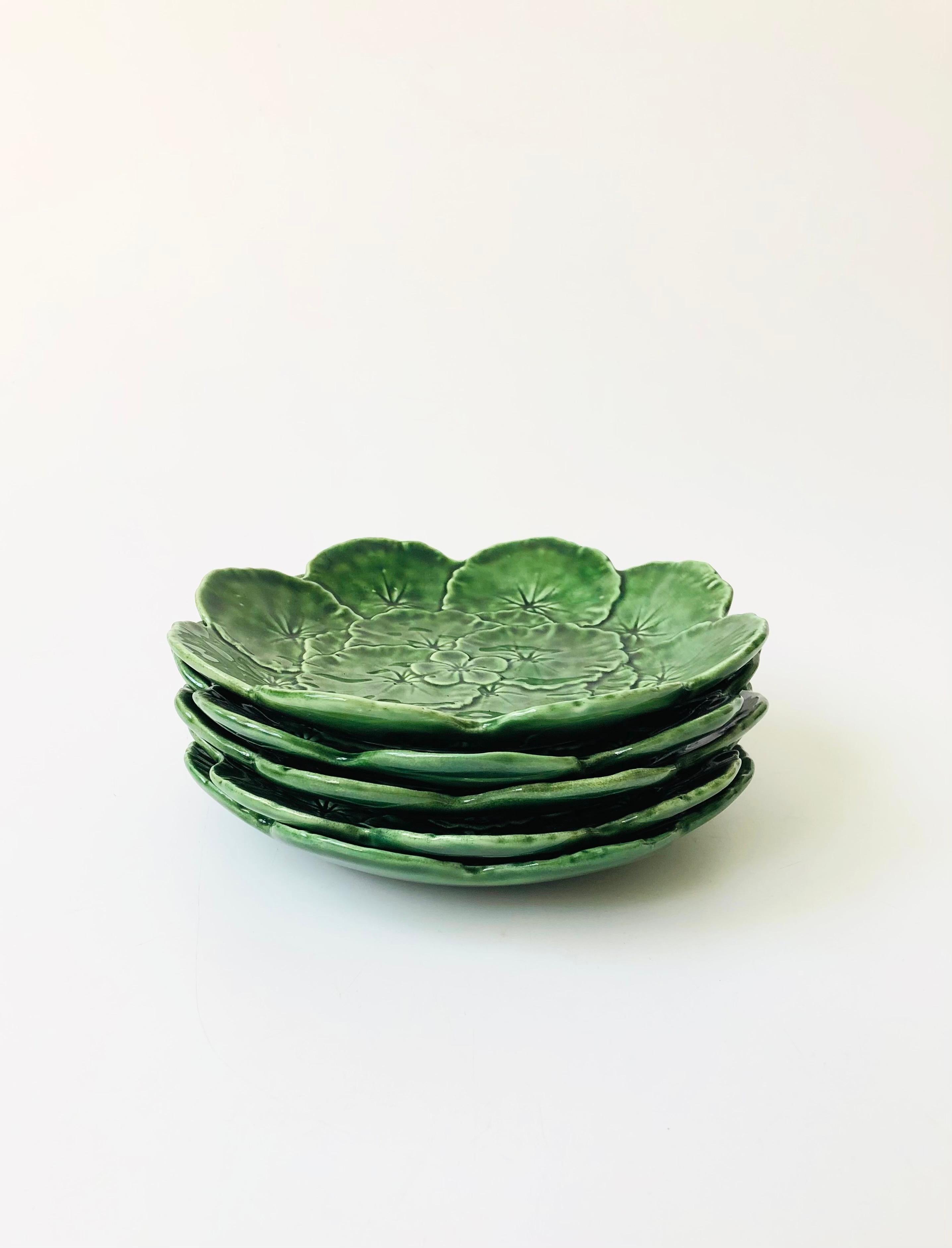 A set of 5 vintage cabbage ware saladplates. Beautiful detailing has been formed into the ceramic to create a design of layered leaves. Made in Portugal, marked on the base.
