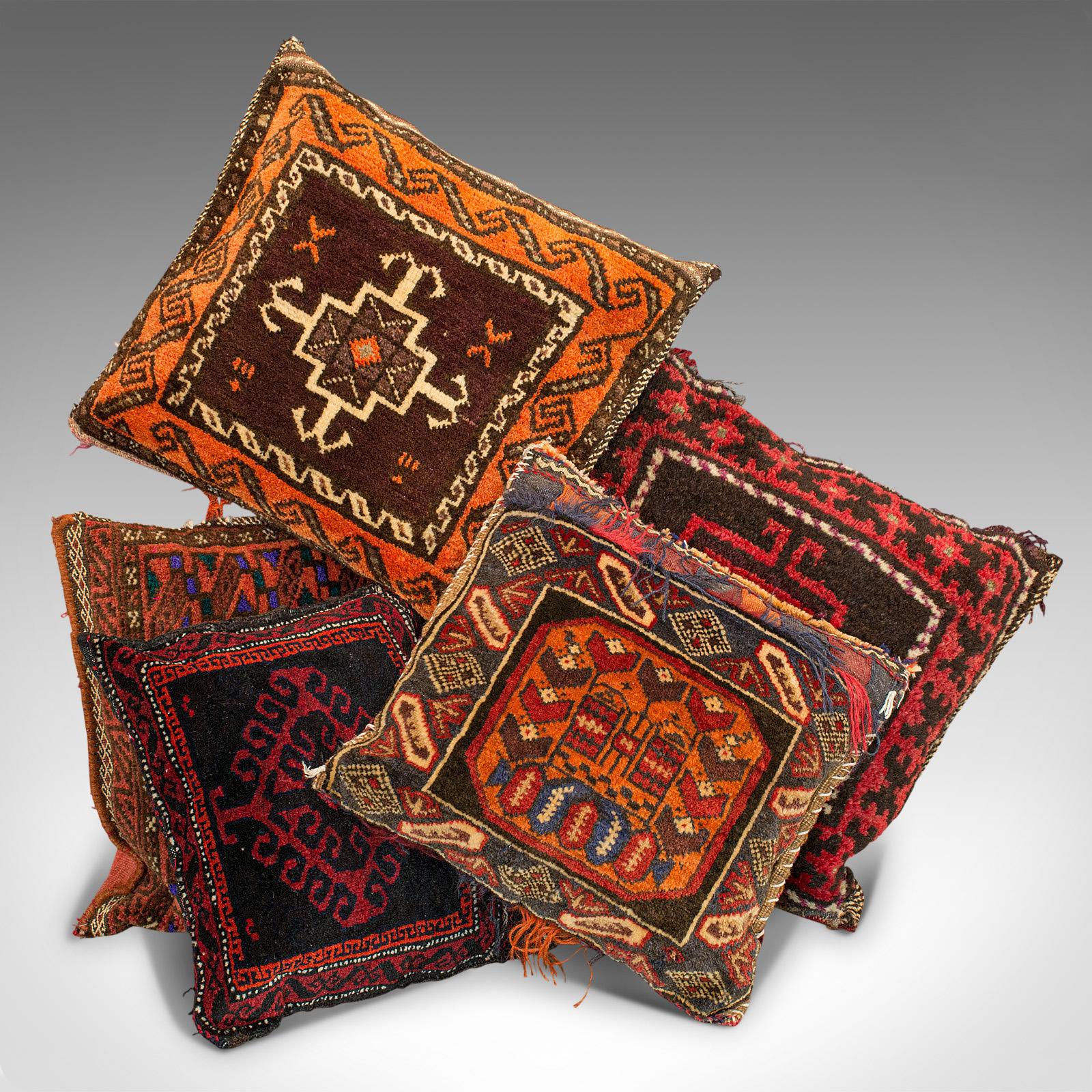 This is a set of 5 vintage Kilim cushions. A North African quintet of camel bag throw pillows, dating to the mid-20th century, circa 1950.

Add a dash of Casablanca glamour to your lounge
Displaying a desirable aged patina to each