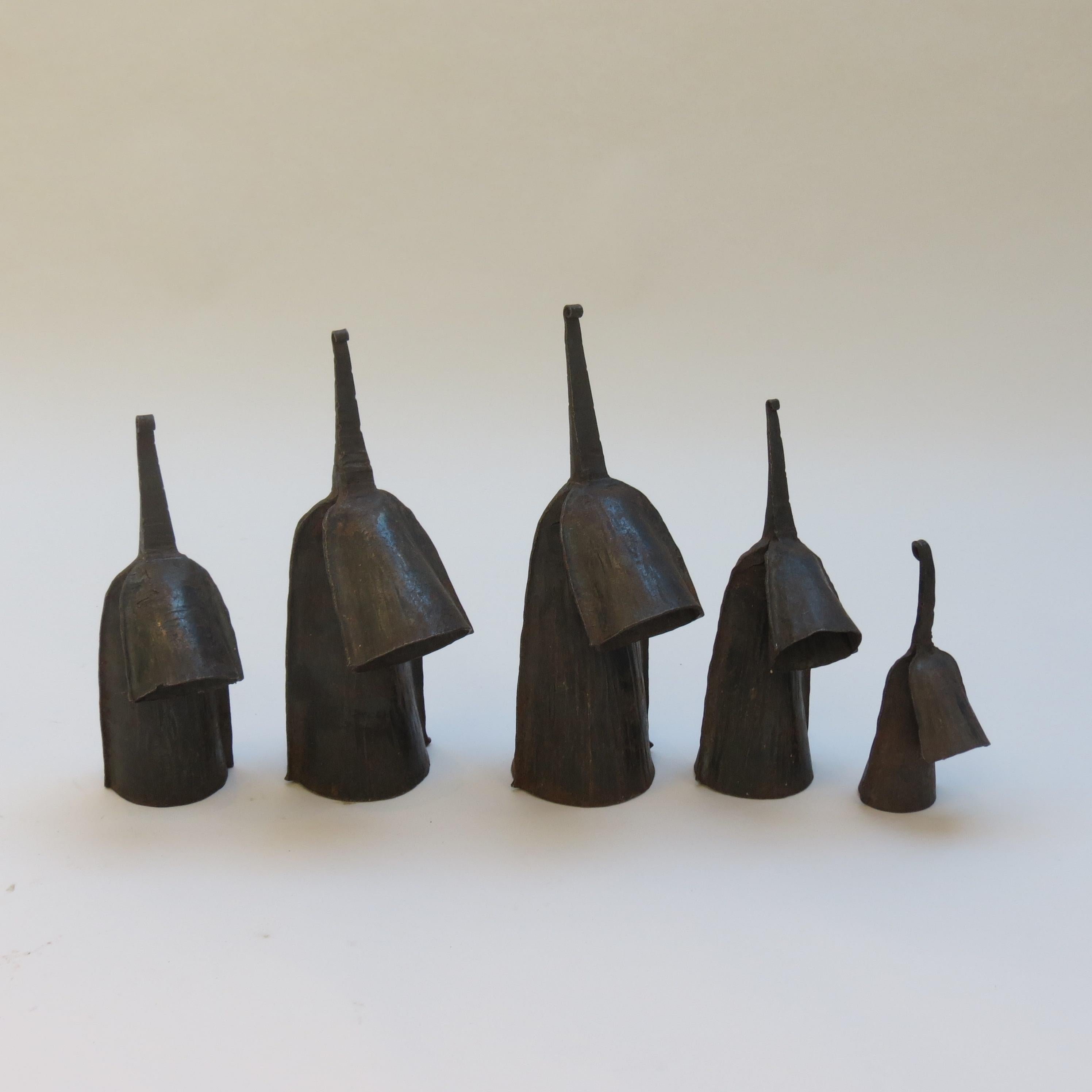 Set of 5 vintage Agogo bells in graduating size. They are made from steel and have been hand produced in Ghana. The are originally used as a percussion instrument and as a group are extremely decorative.

A nice vintage hand produced set with good